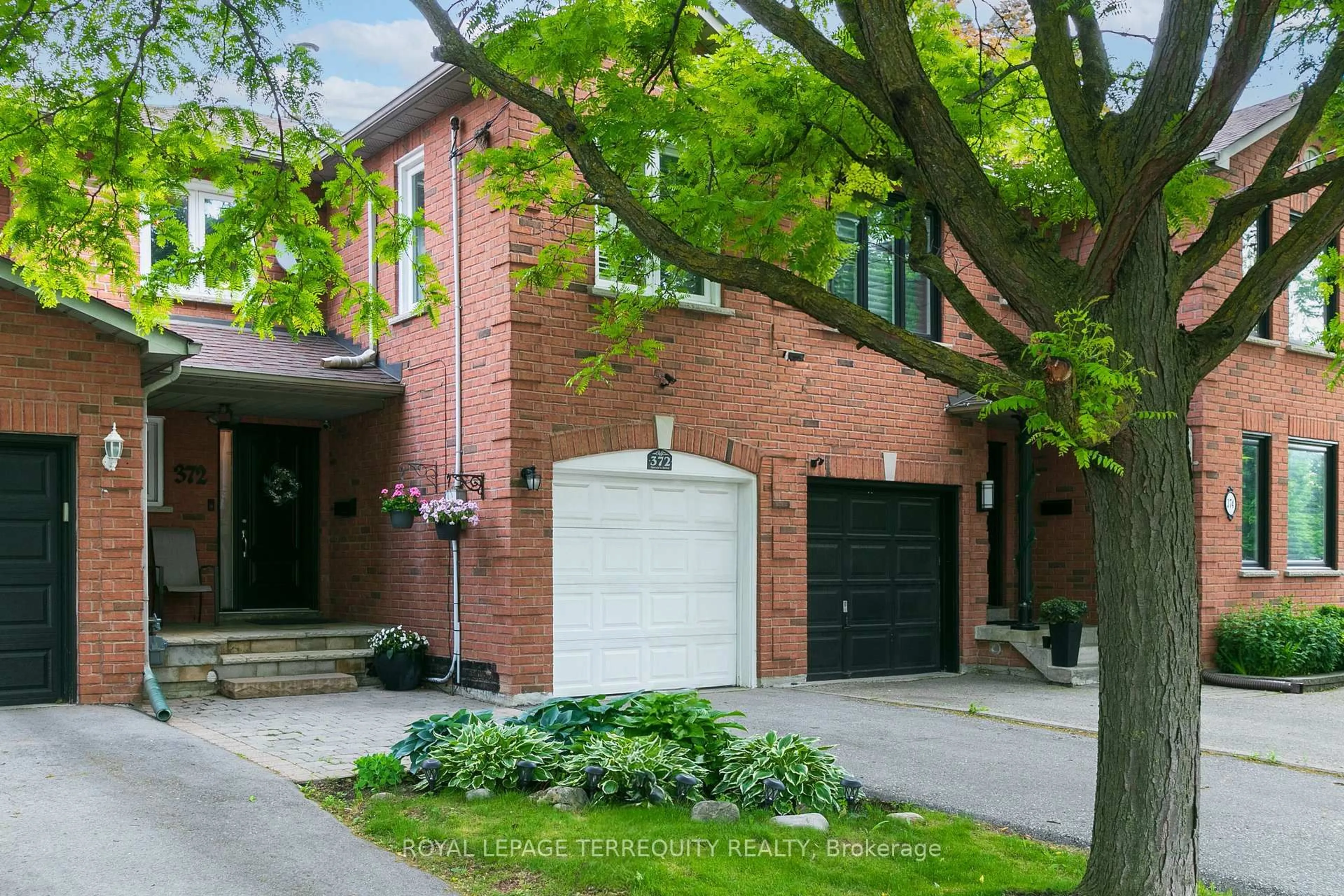 Home with brick exterior material, street for 372 Queens Dr, Toronto Ontario M6L 1M5