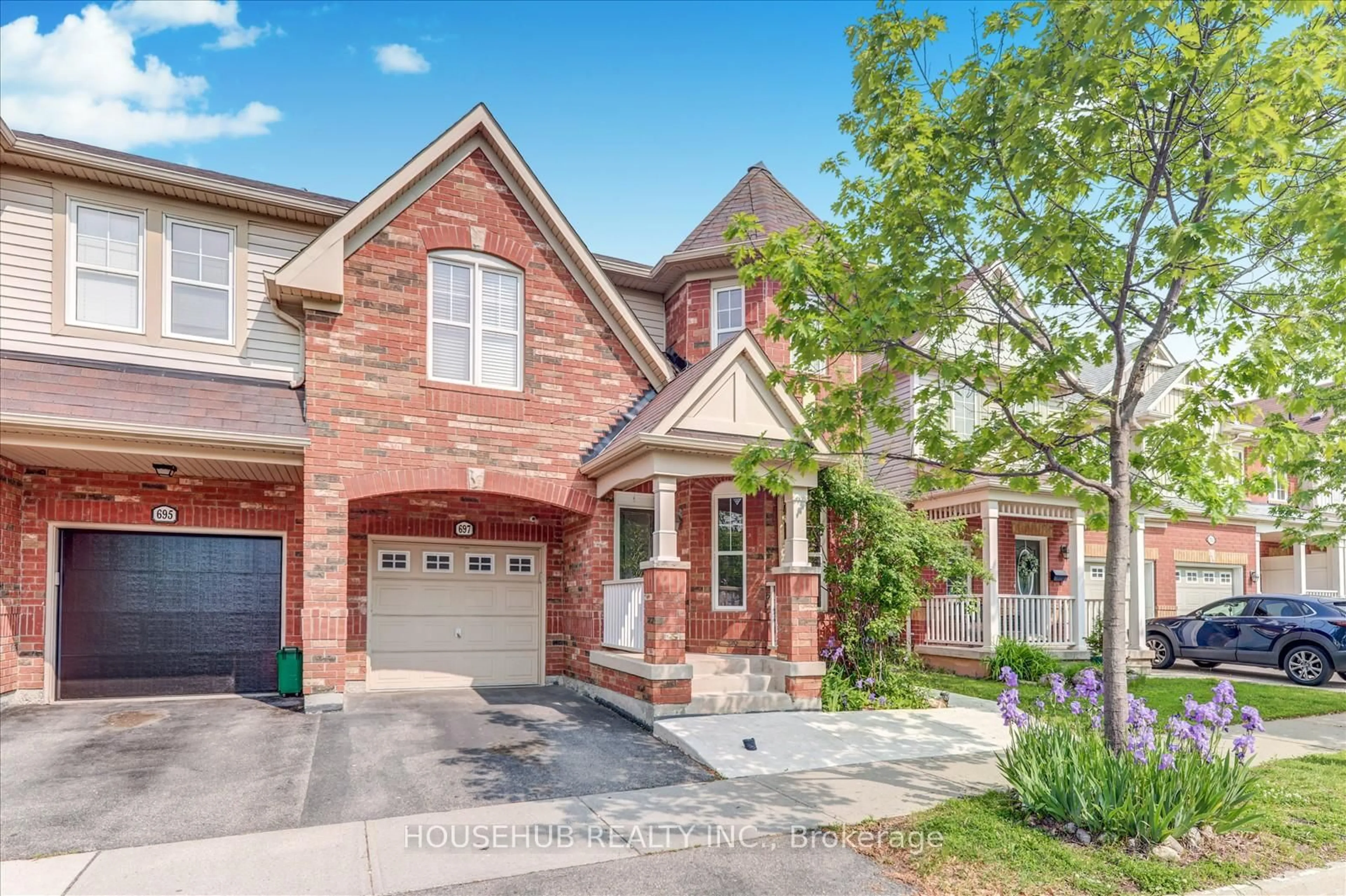 Home with brick exterior material, street for 697 Ambroise Cres, Milton Ontario L9T 0M4