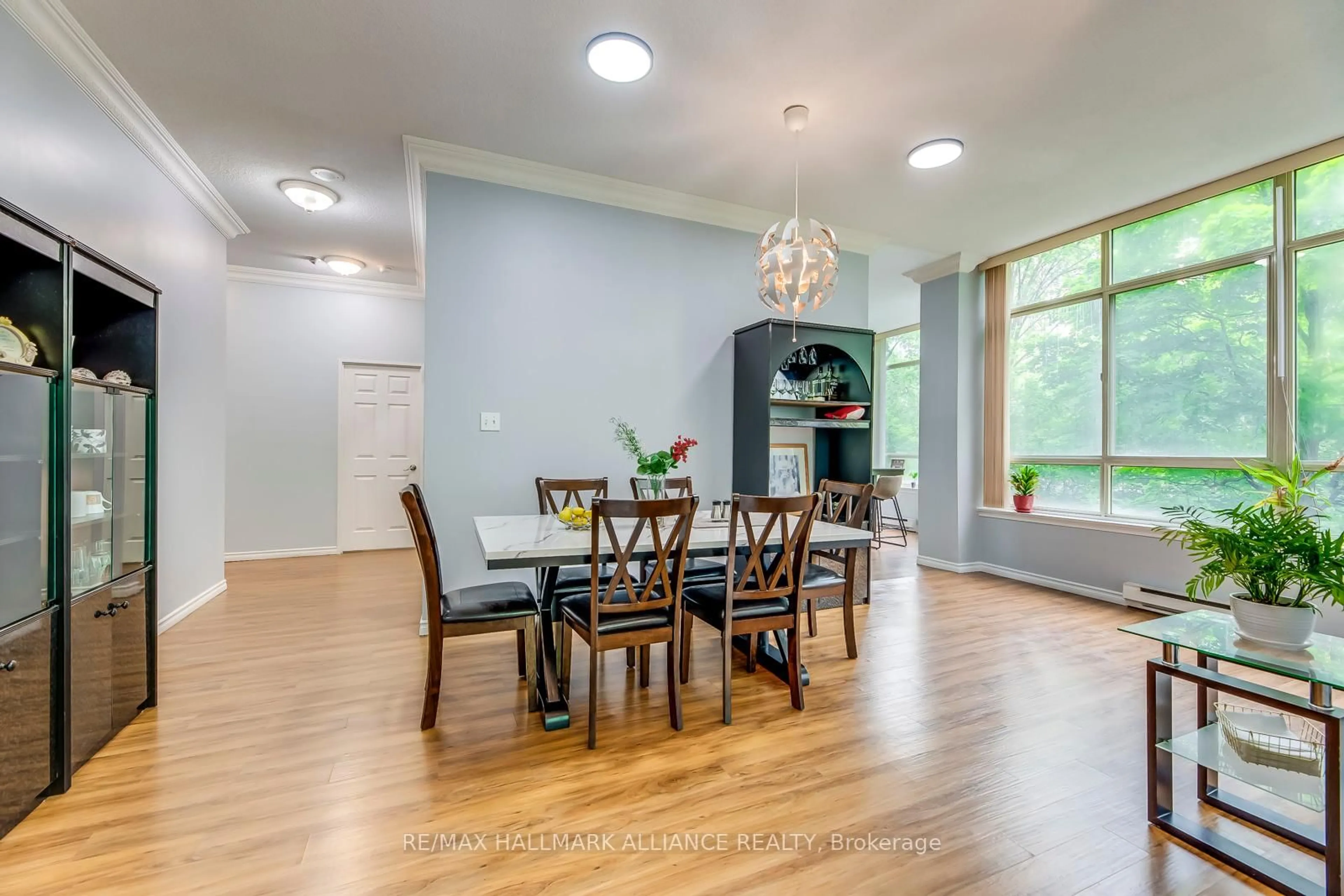 Dining room, wood/laminate floor for 3605 kariya Dr #104, Mississauga Ontario L5B 3J4