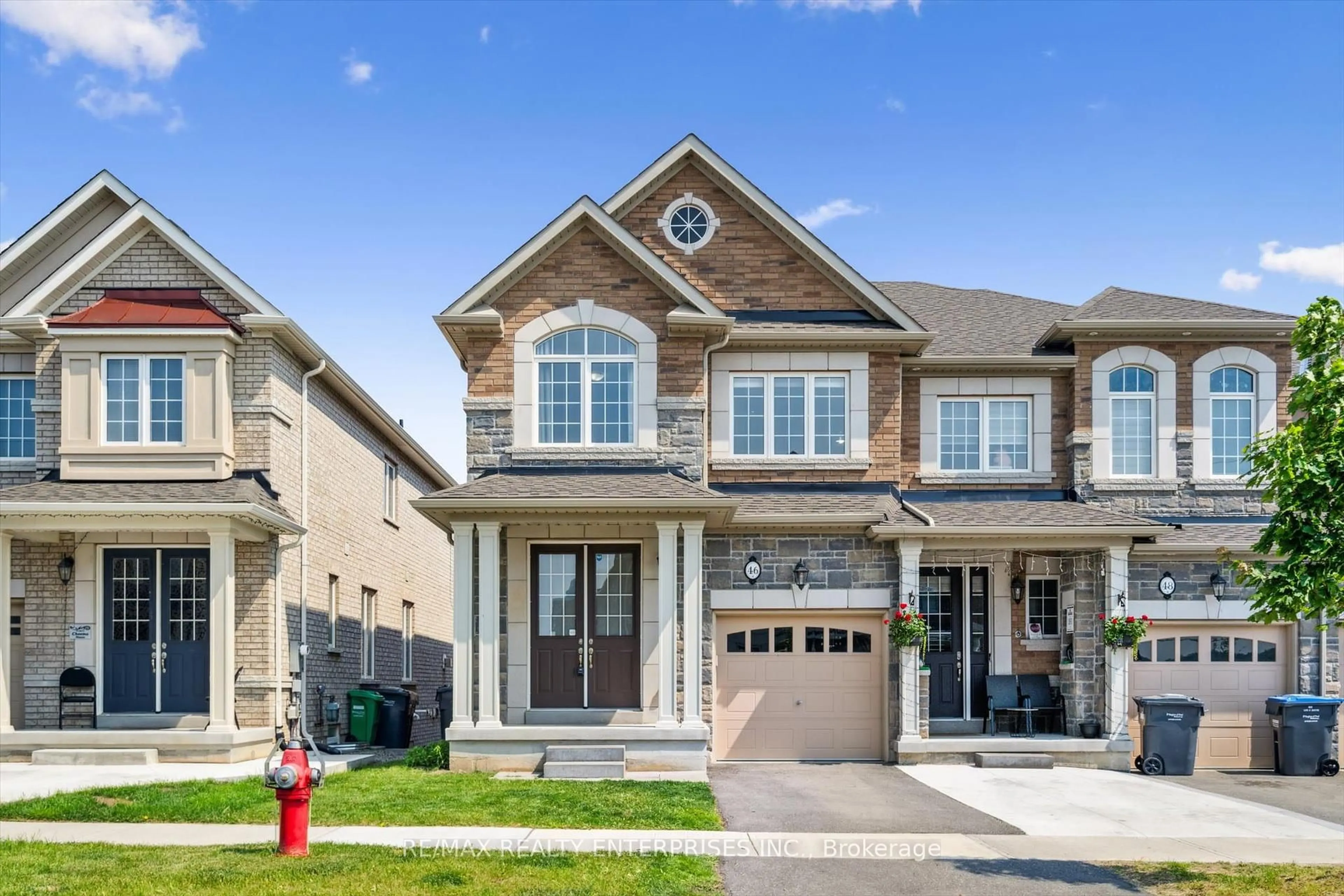 Home with brick exterior material, street for 46 Benhurst Cres, Brampton Ontario L7A 5A3