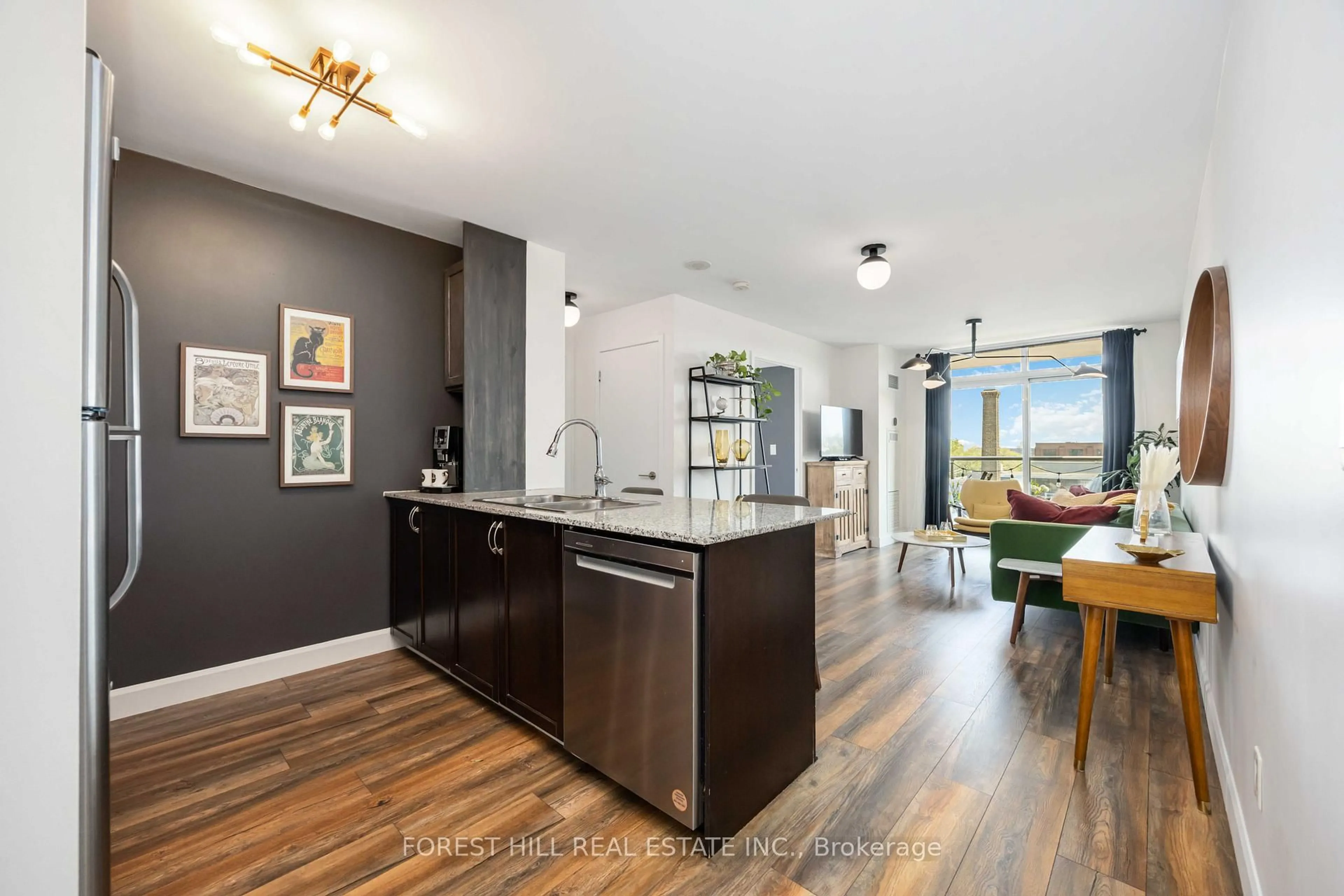 Open concept kitchen, wood/laminate floor for 812 Lansdowne Ave #405, Toronto Ontario M6H 4K5