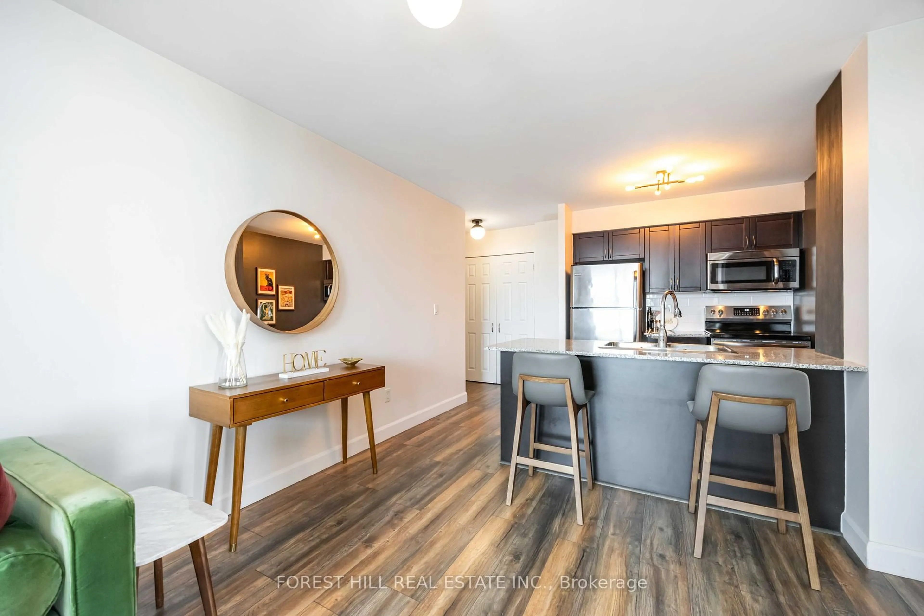 Open concept kitchen, wood/laminate floor for 812 Lansdowne Ave #405, Toronto Ontario M6H 4K5