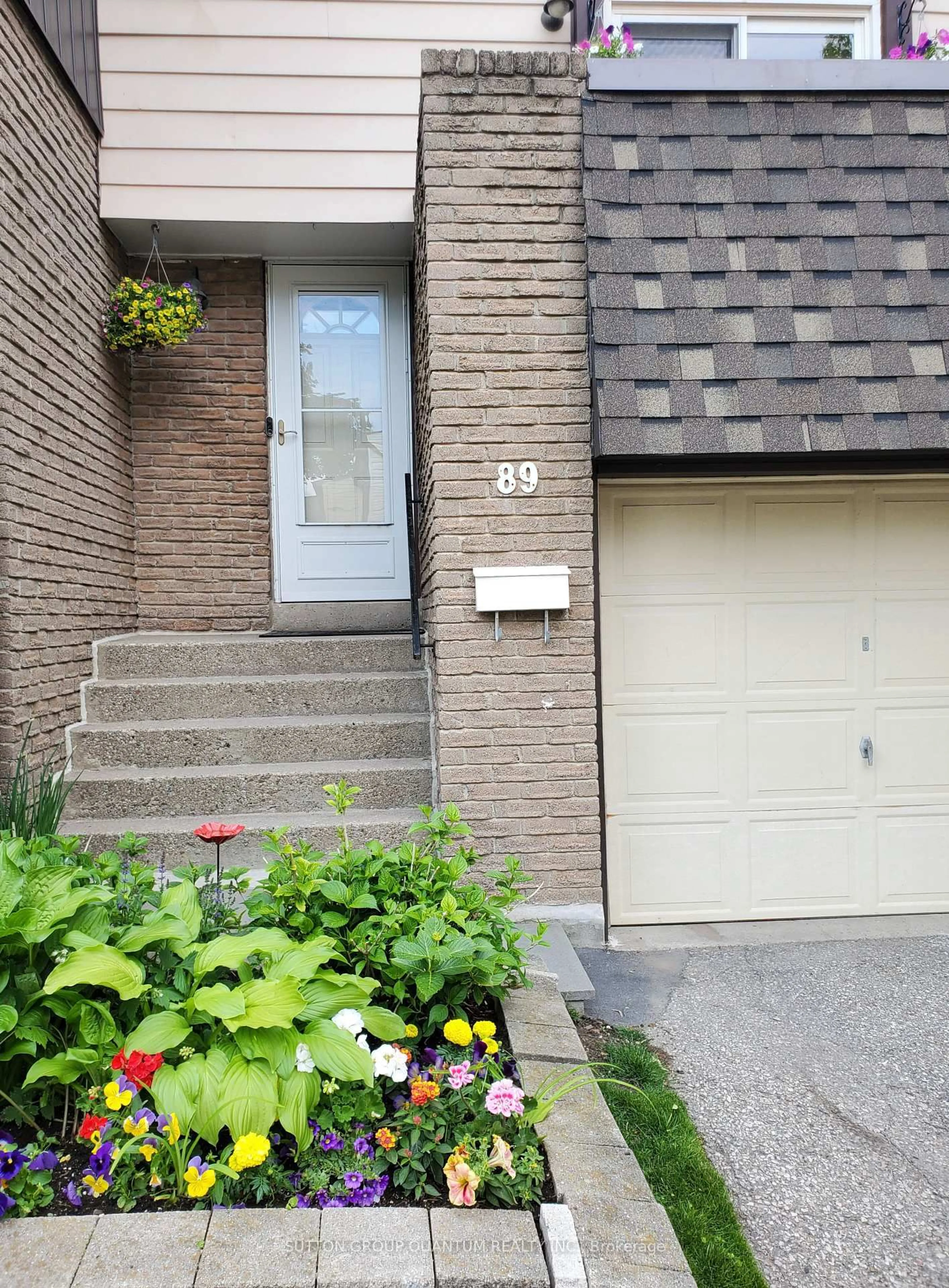 Home with brick exterior material, street for 1221 Dundix Rd #89, Mississauga Ontario L4Y 3Y9