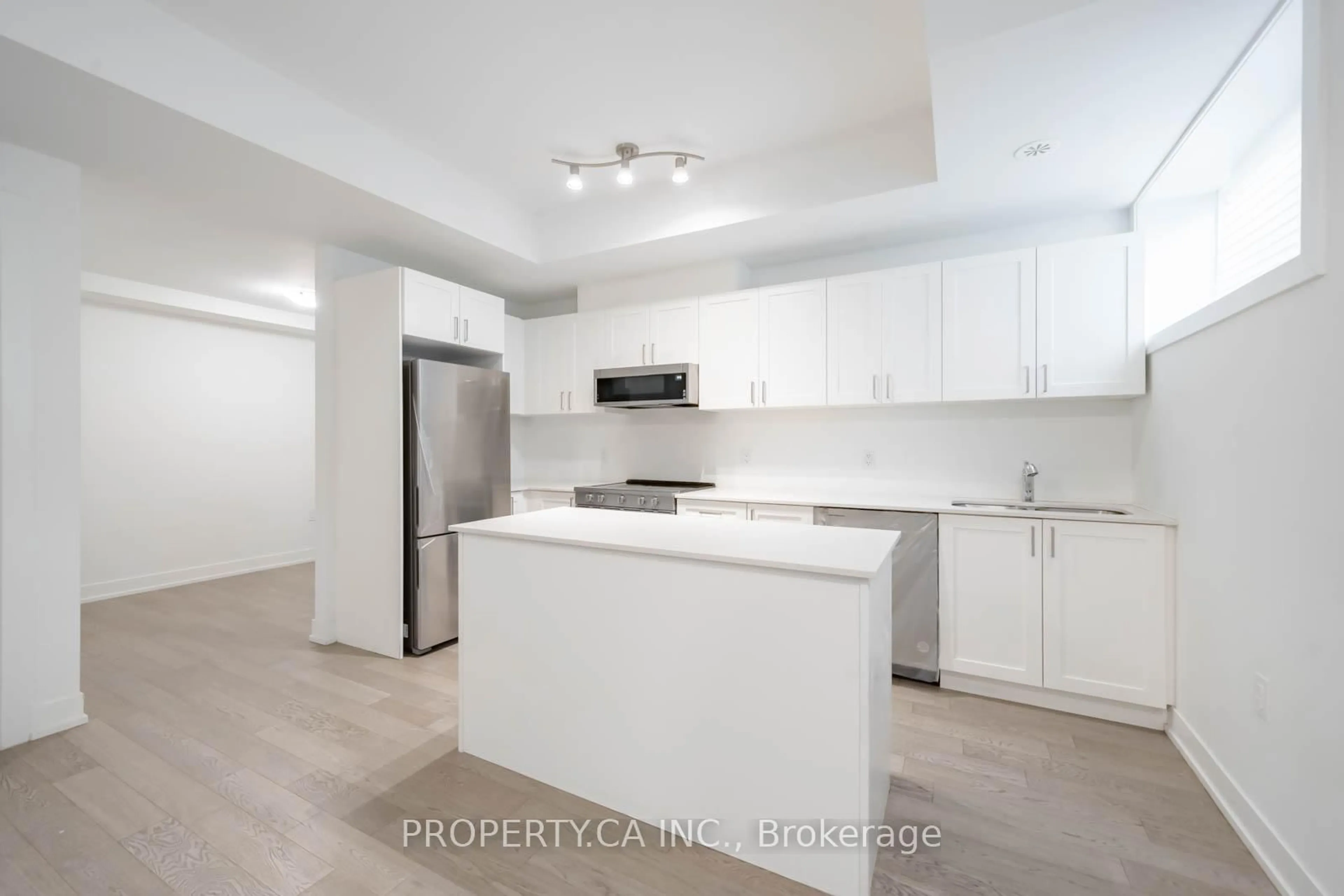 Open concept kitchen, unknown for 1115 Douglas McCurdy Common #103, Mississauga Ontario L5G 0C6