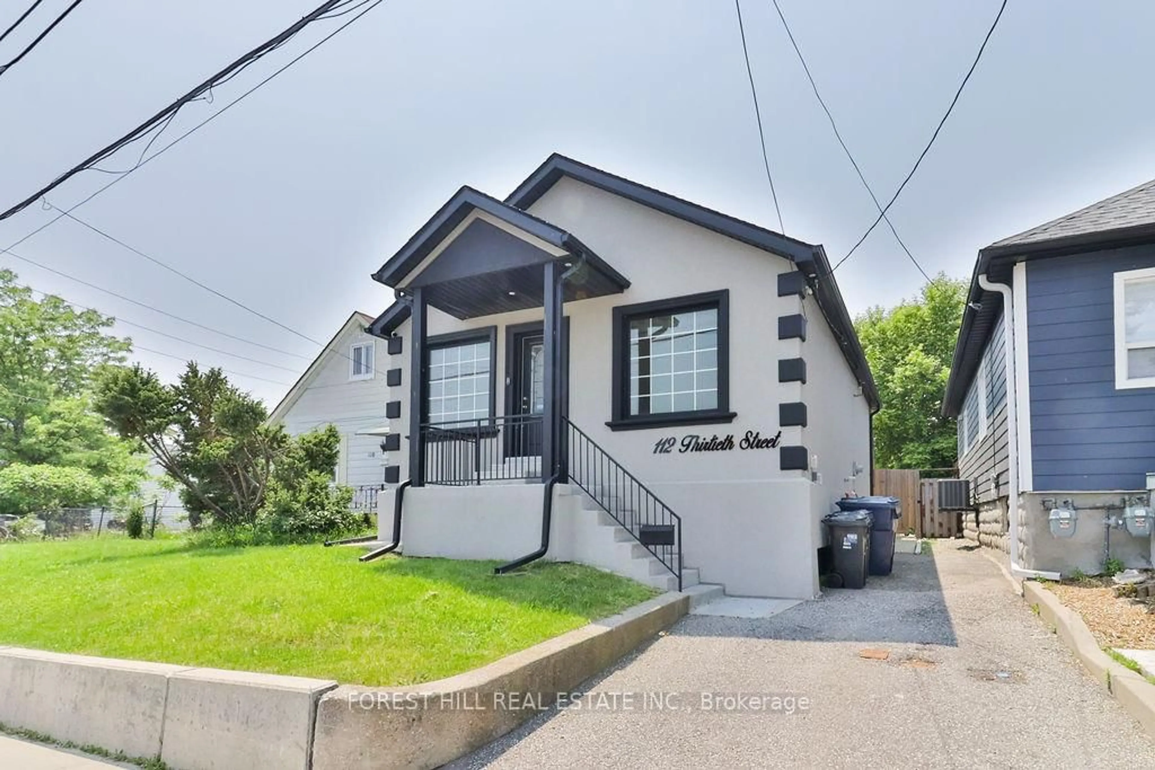 Home with vinyl exterior material, street for 112 Thirtieth St, Toronto Ontario M8W 3B8
