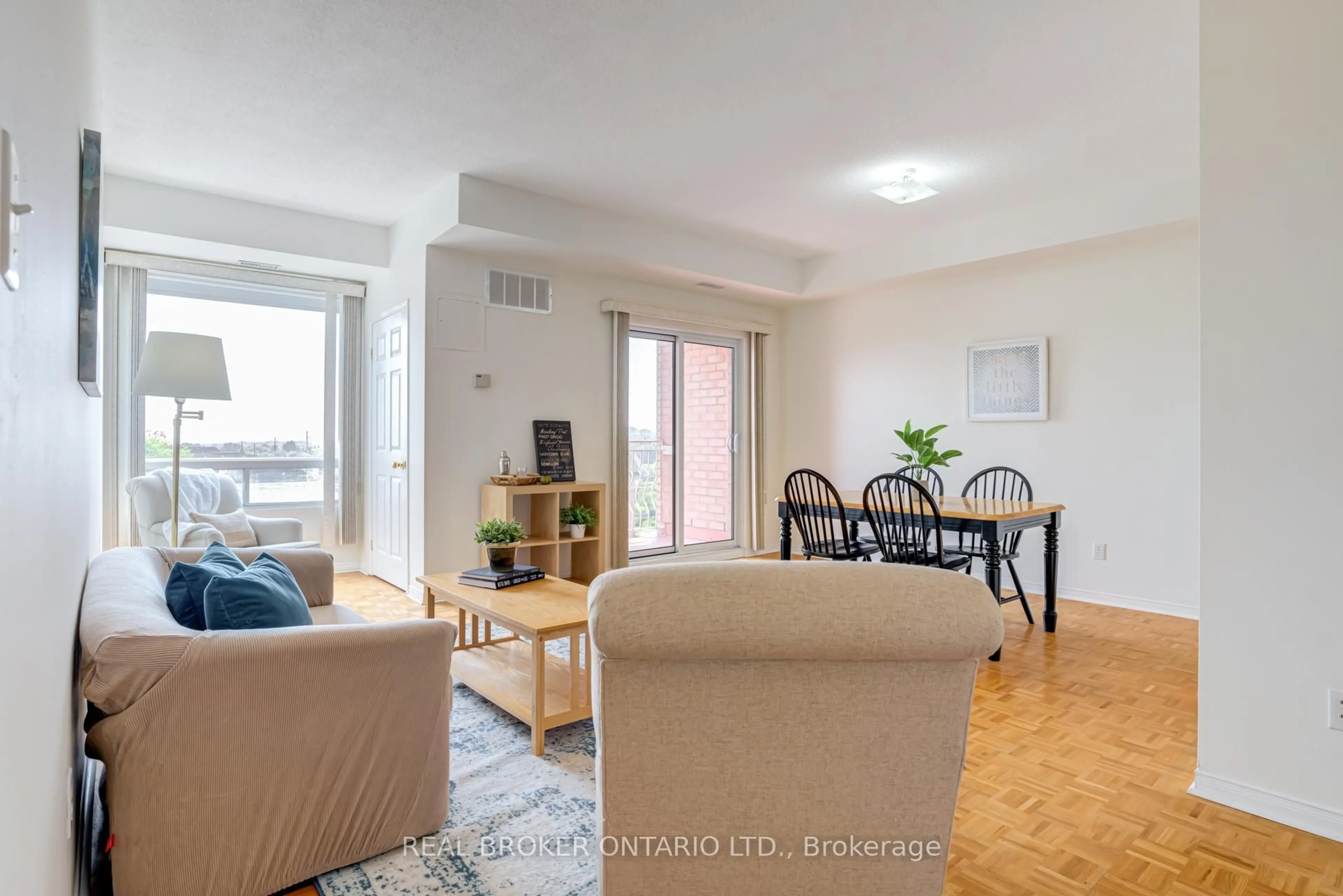 Living room with furniture, wood/laminate floor for 32 Tannery St #602, Mississauga Ontario L5M 6T6