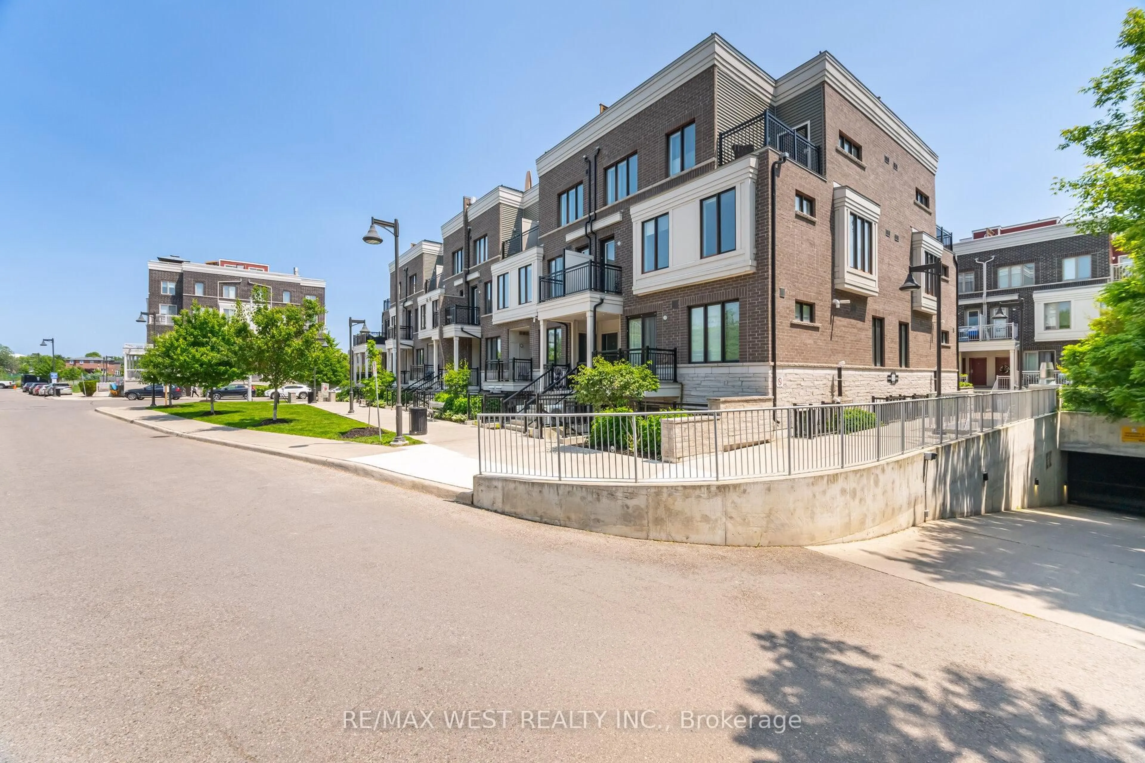 A pic from outside/outdoor area/front of a property/back of a property/a pic from drone, street for 150 Long Branch Ave #4, Toronto Ontario M8W 0A9