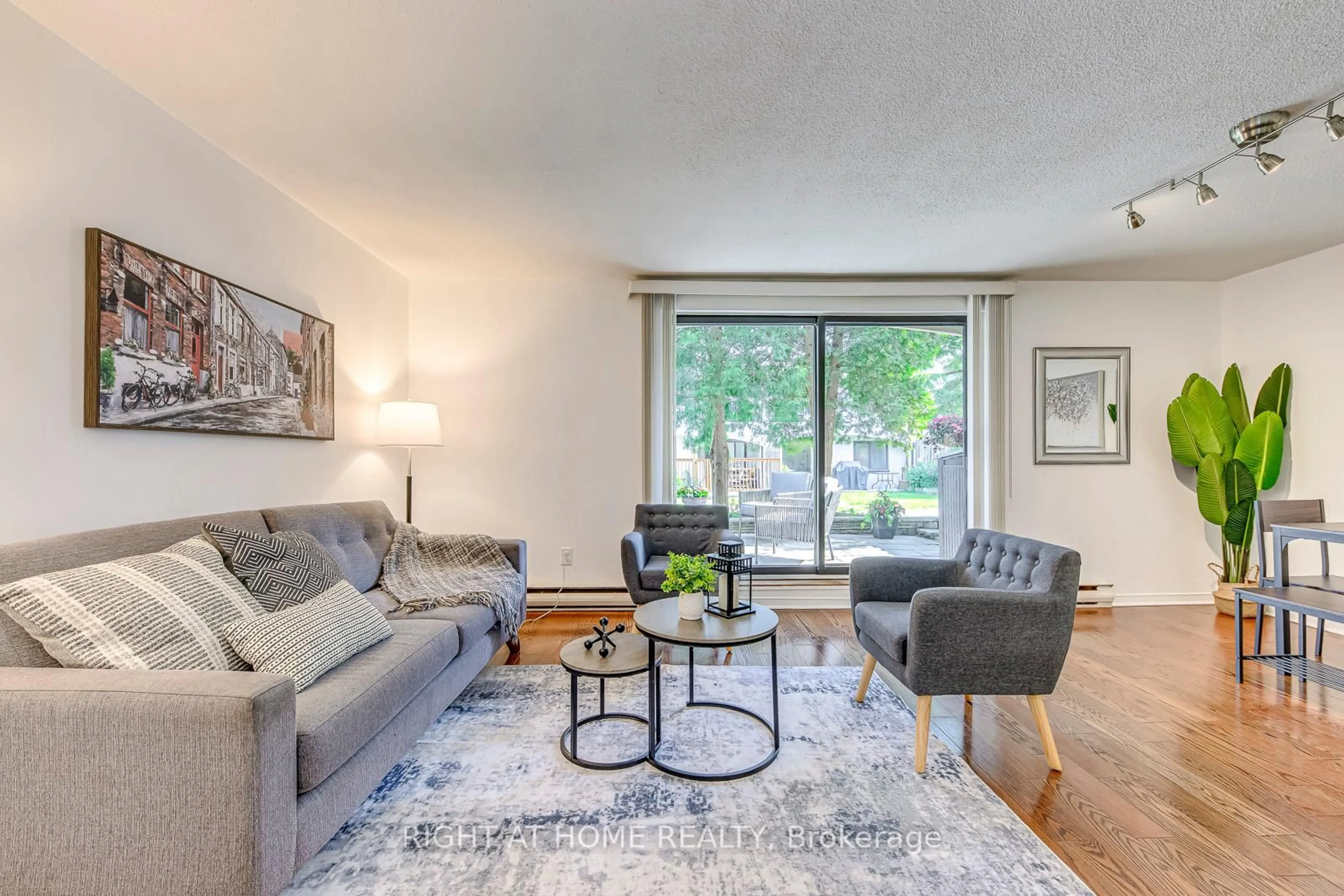 Living room with furniture, unknown for 1058 Falgarwood Dr #133, Oakville Ontario L6H 2P3