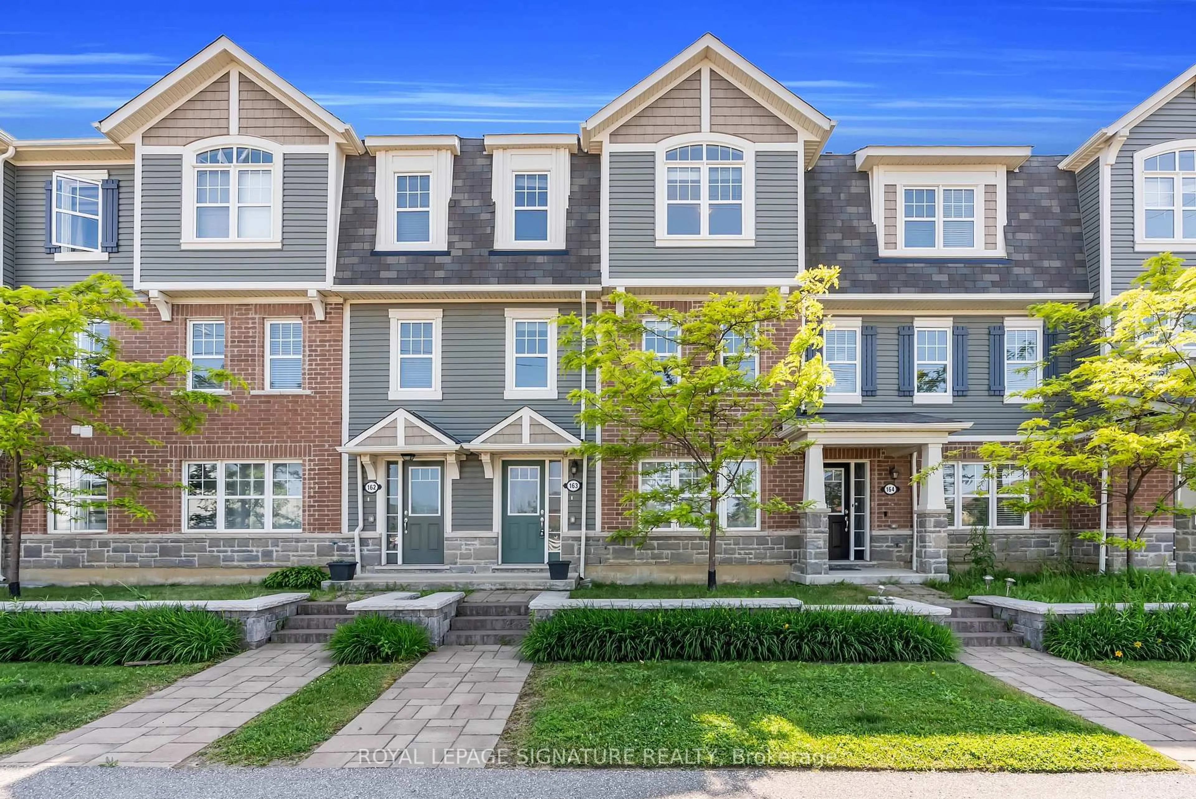 Home with brick exterior material, street for 1000 Asleton Blvd #163, Milton Ontario L9T 9L3