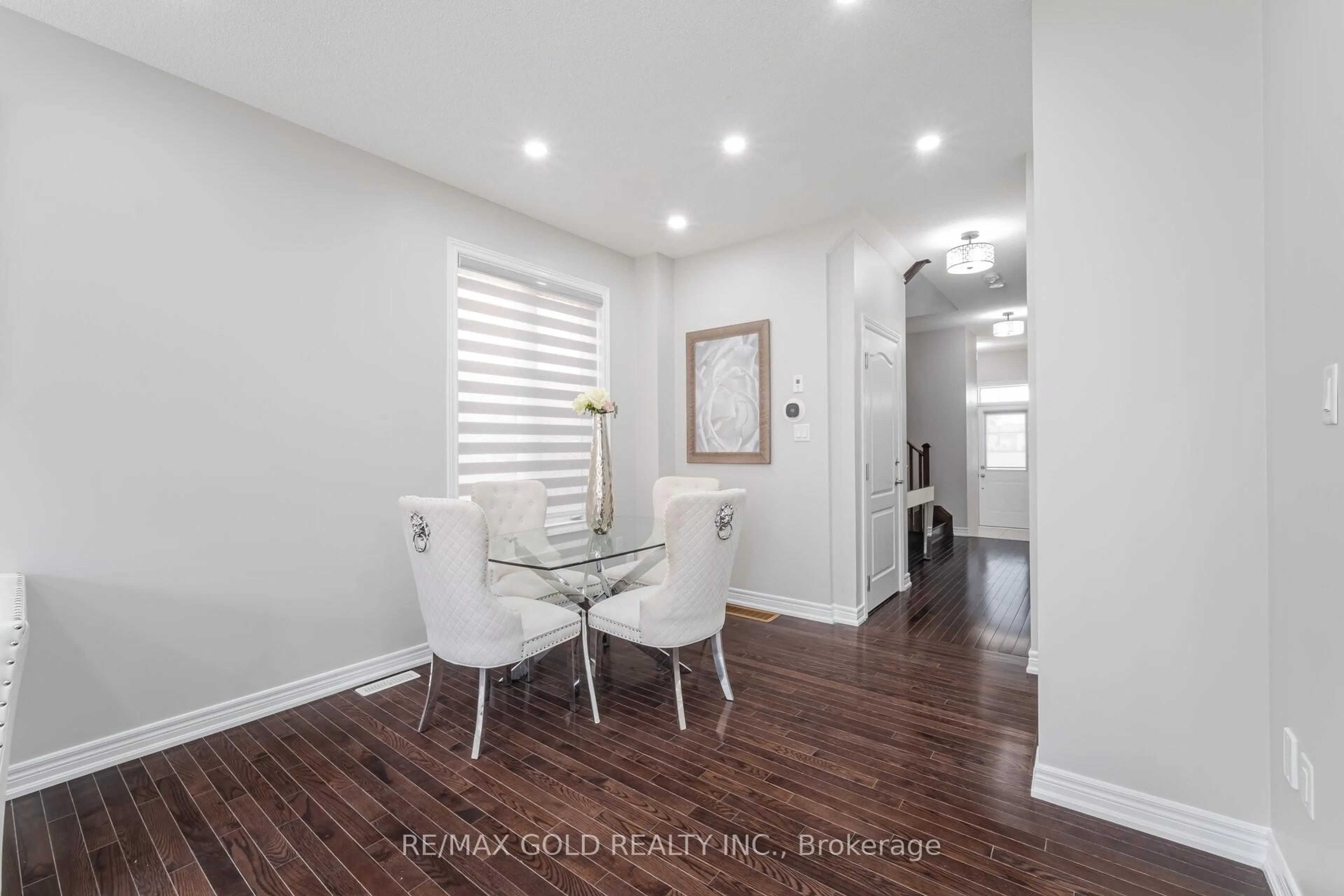 Dining room, wood/laminate floor for 109 Cobriza Cres, Brampton Ontario L7A 5A6