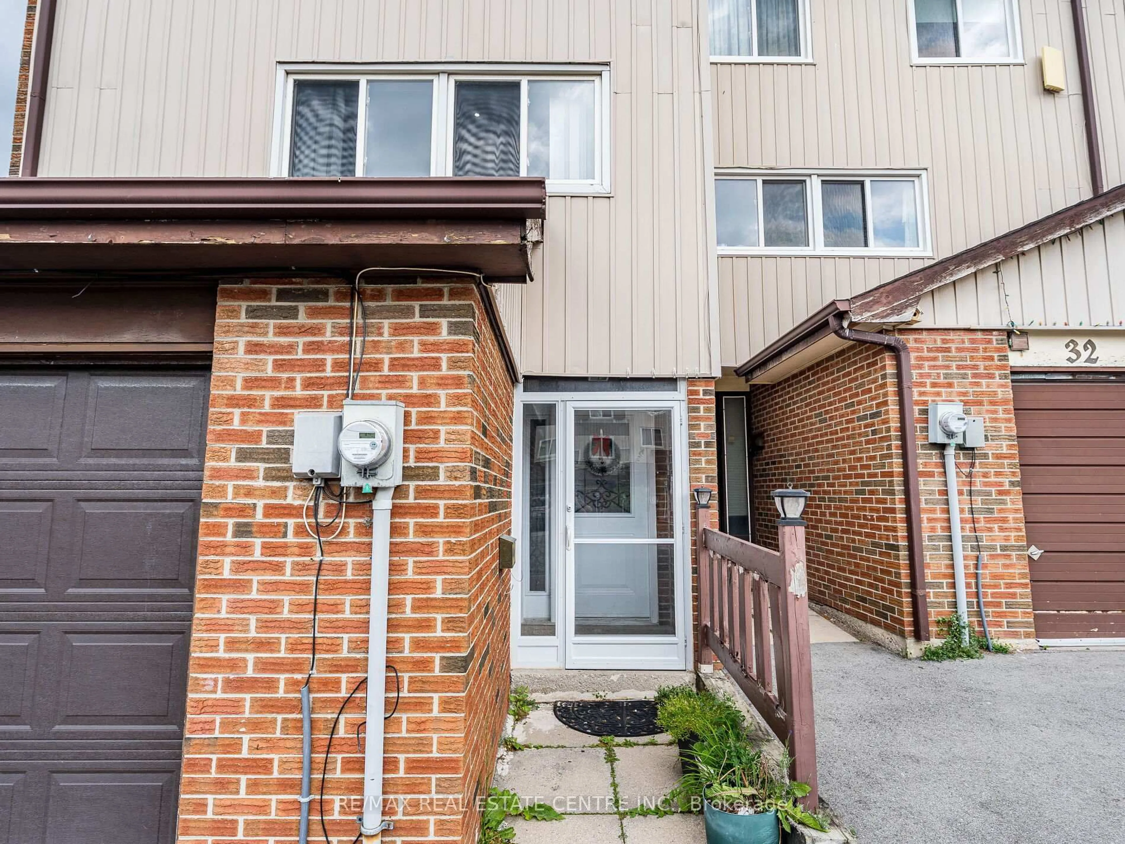 Home with brick exterior material, street for 34 San Roberto Way #1, Toronto Ontario M3L 2J5