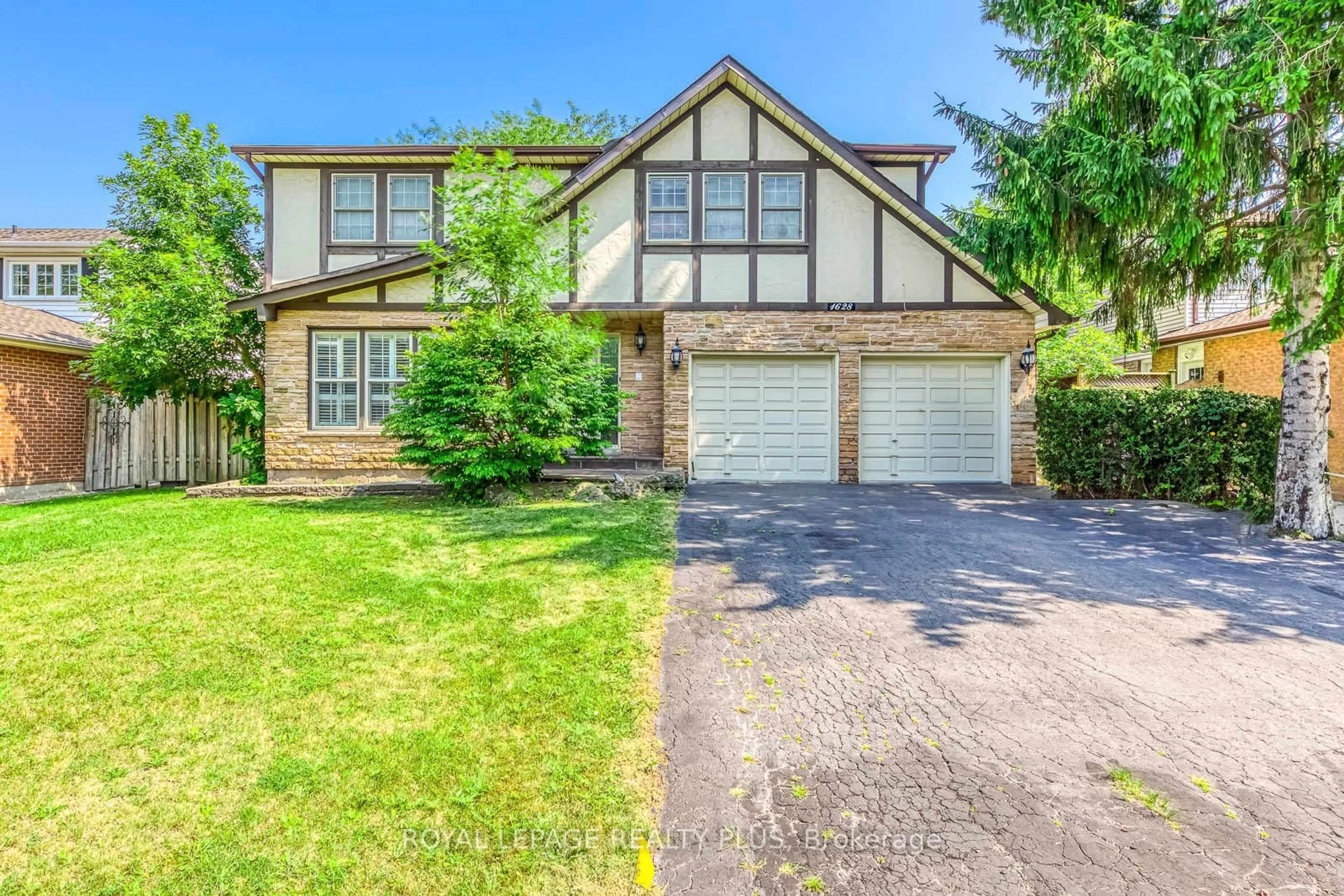 Home with brick exterior material, street for 1628 Woodeden Dr, Mississauga Ontario L5H 3S5