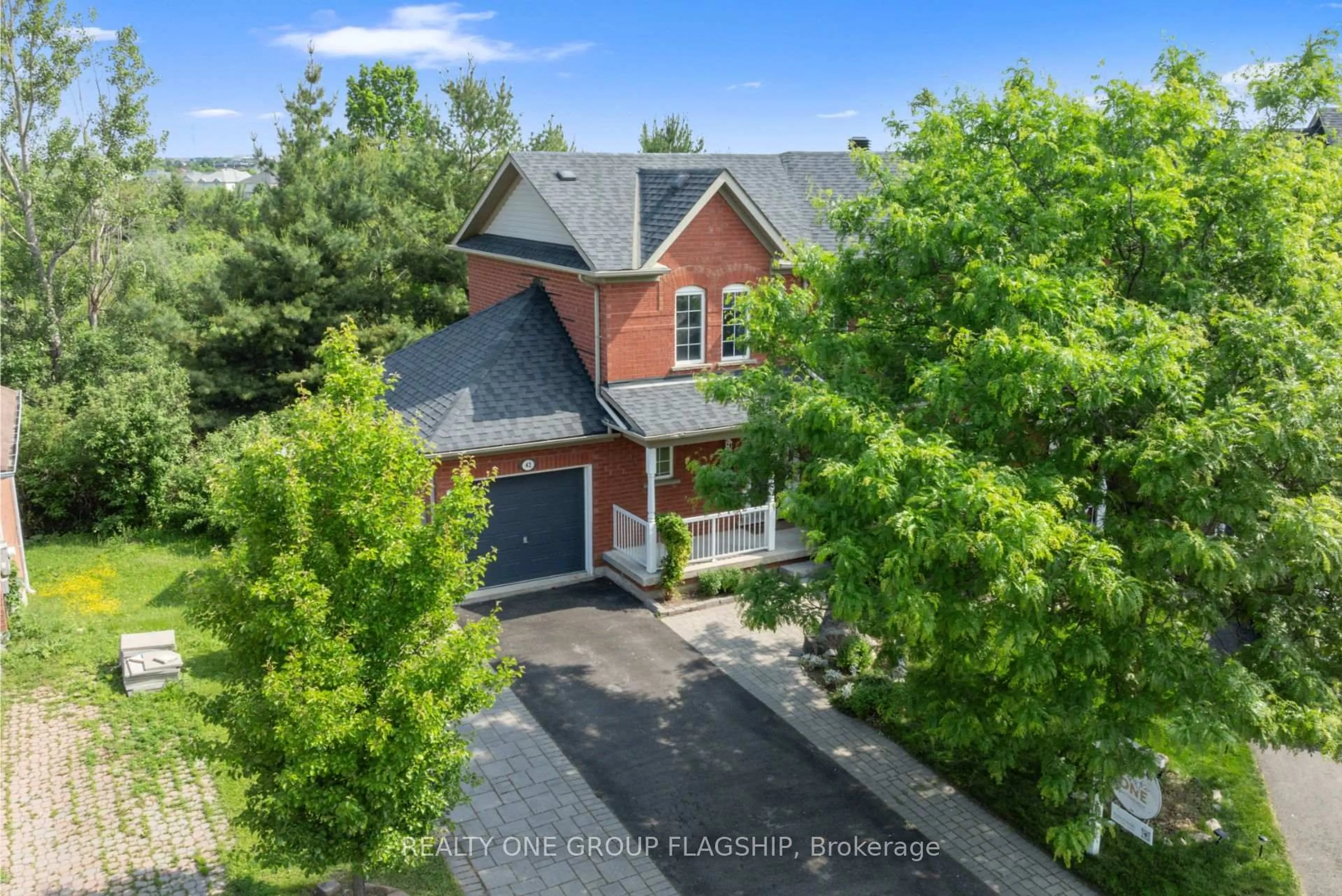 A pic from outside/outdoor area/front of a property/back of a property/a pic from drone, street for 42 Monaco Crt, Brampton Ontario L7A 1X4