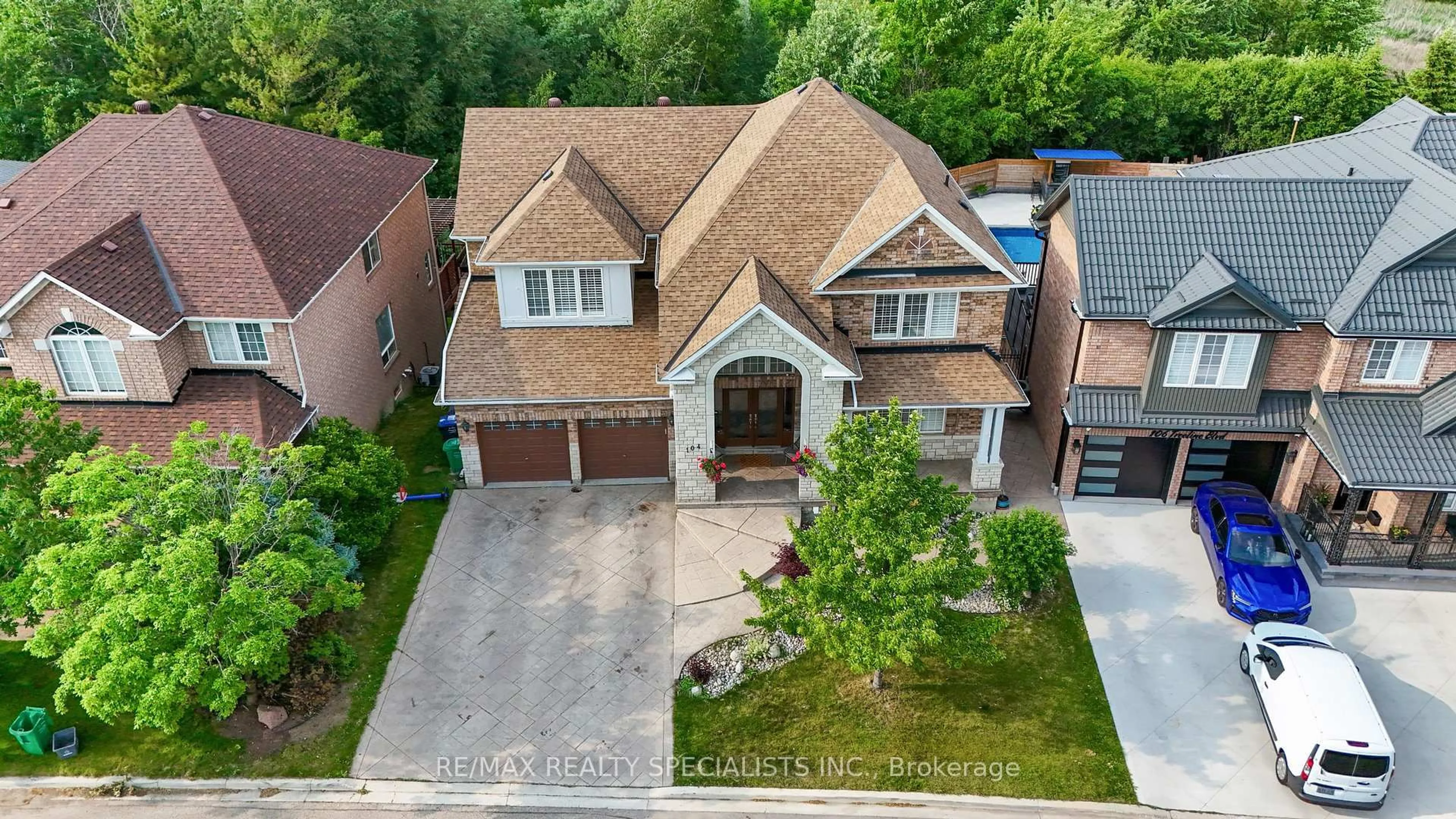 A pic from outside/outdoor area/front of a property/back of a property/a pic from drone, street for 104 Treeline Blvd, Brampton Ontario L6P 1A7