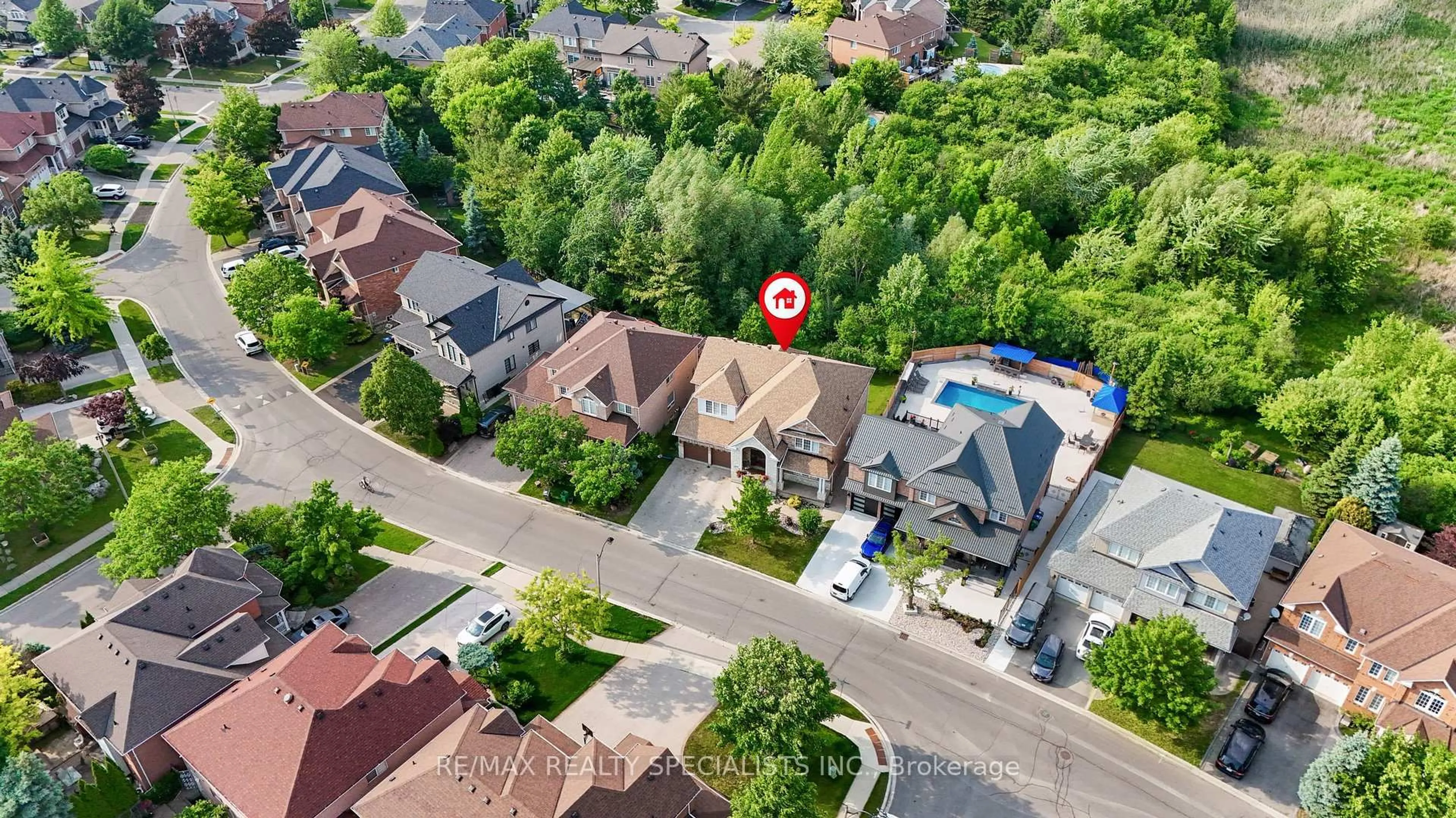 A pic from outside/outdoor area/front of a property/back of a property/a pic from drone, street for 104 Treeline Blvd, Brampton Ontario L6P 1A7