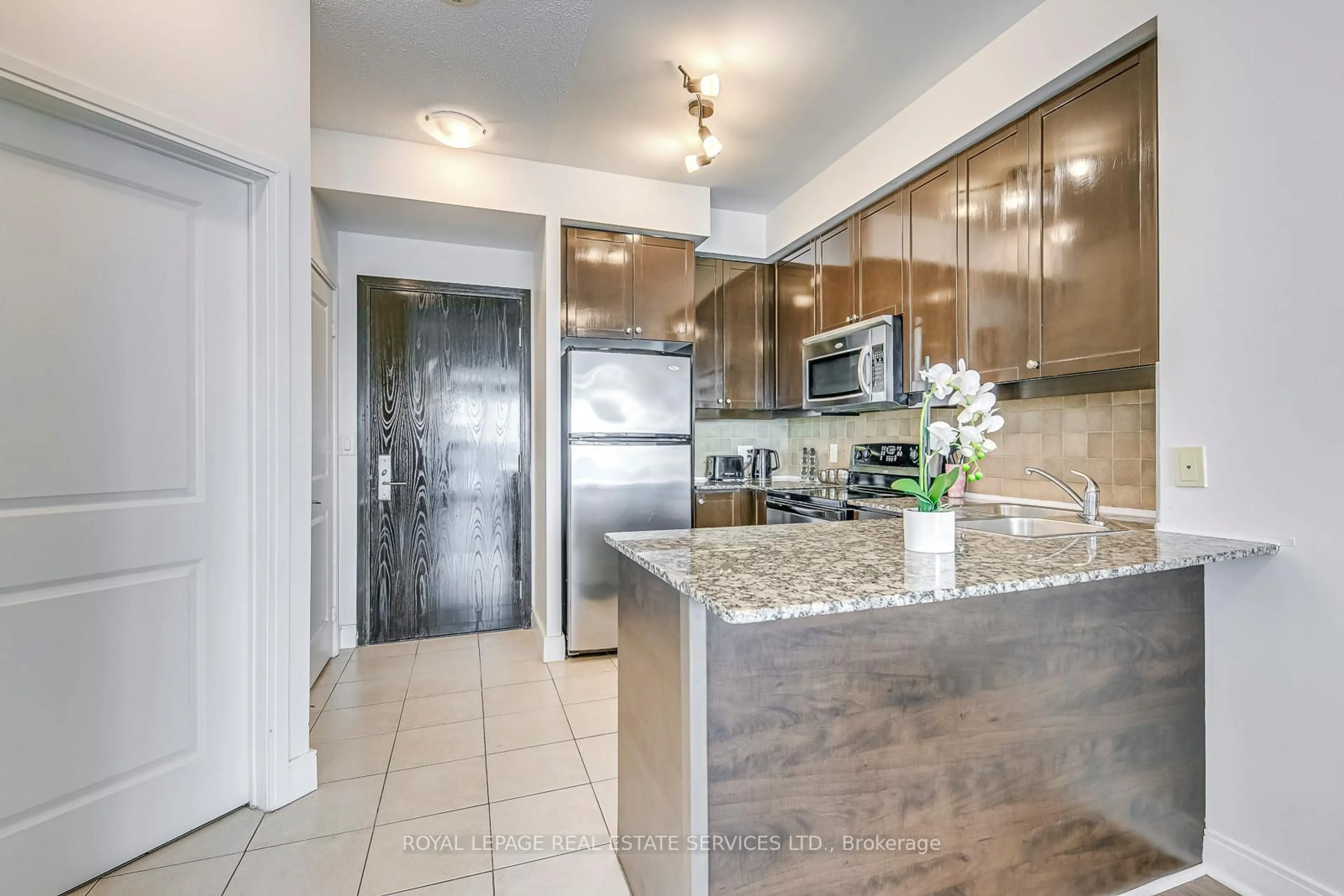 Open concept kitchen, ceramic/tile floor for 80 Absolute Ave #1302, Mississauga Ontario L4Z 0A5
