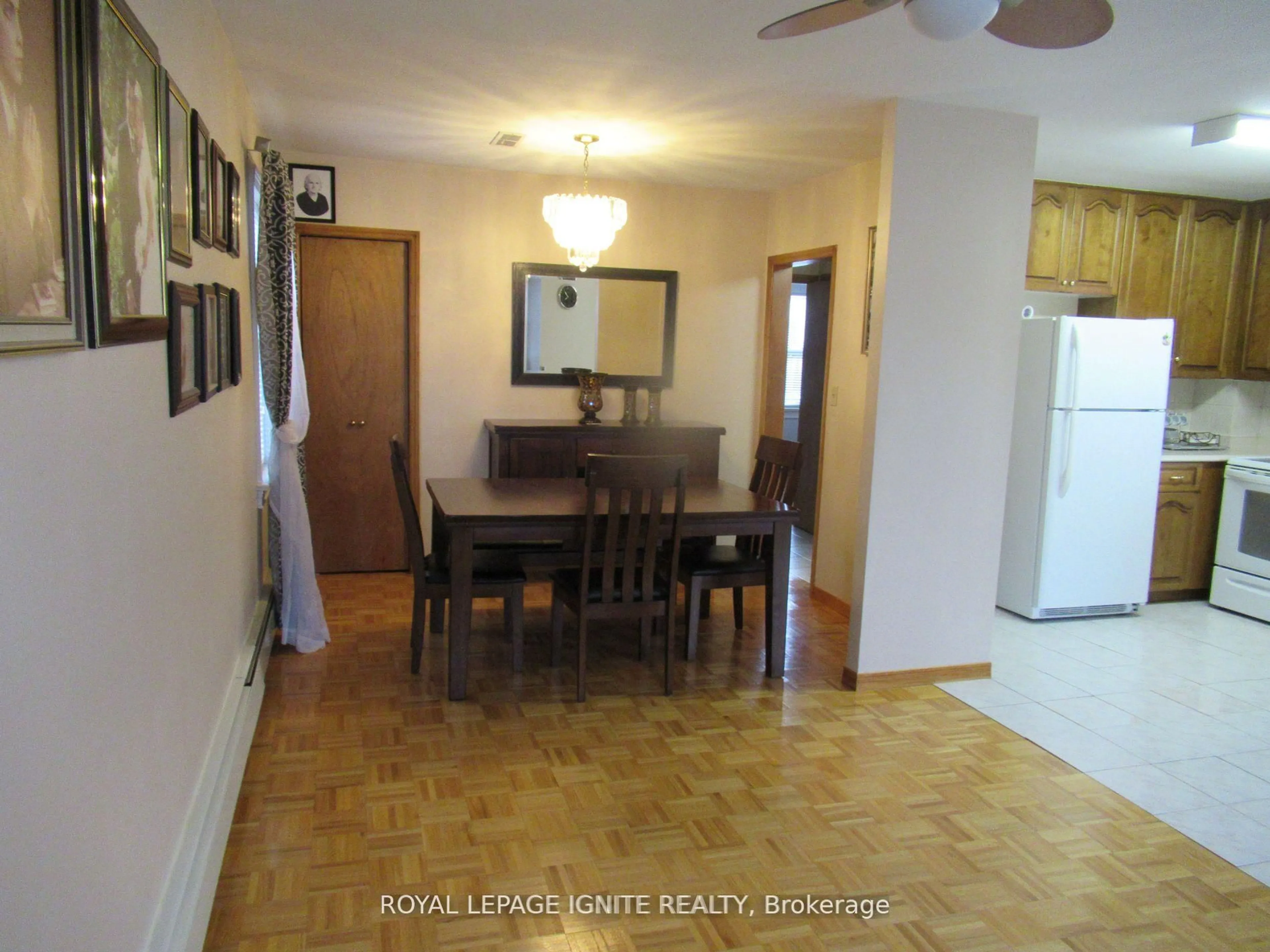 Dining room, wood/laminate floor for 12 Stephen Dr, Toronto Ontario M8Y 3M5