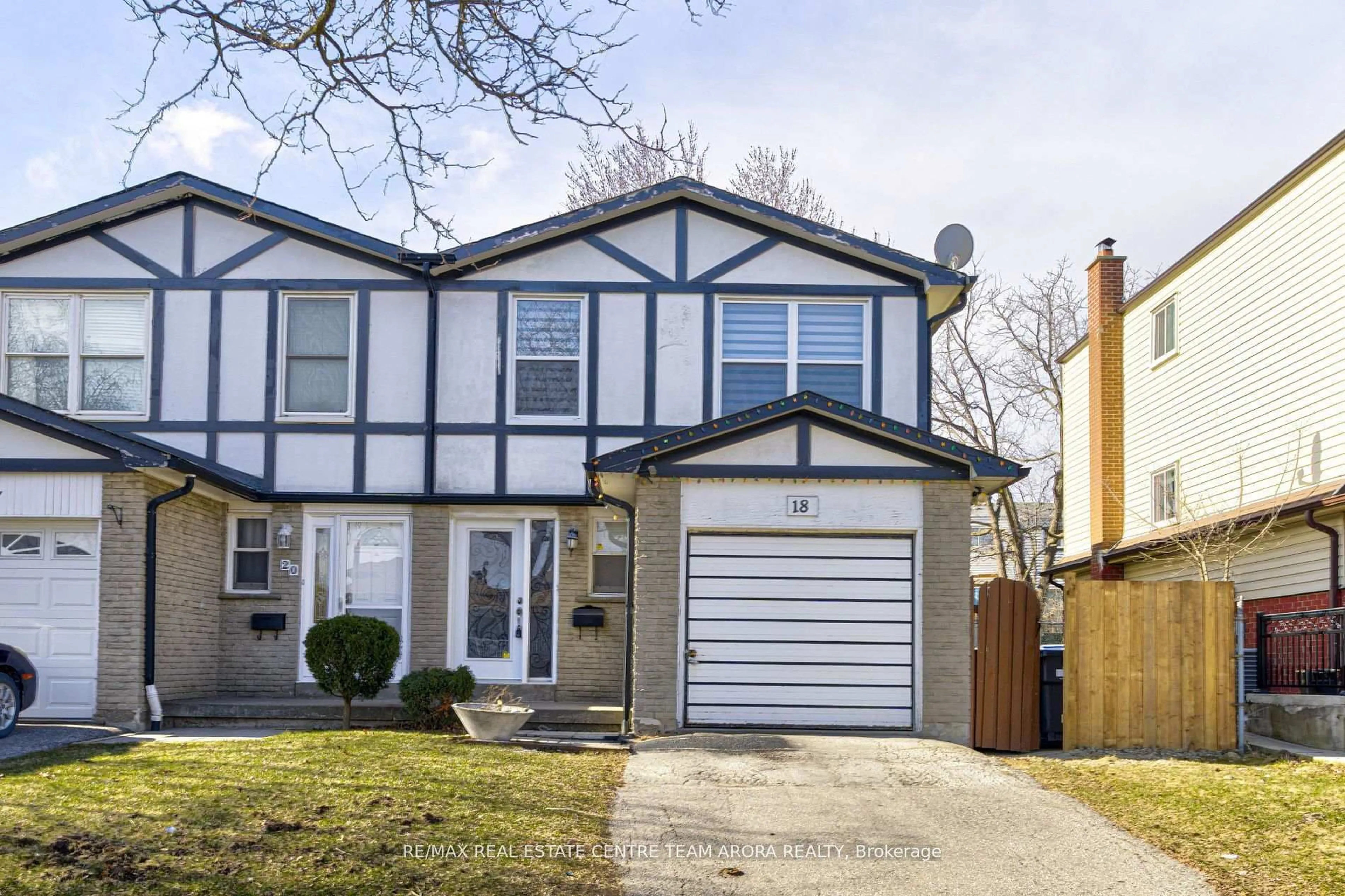 Home with vinyl exterior material, street for 18 Abell Dr, Brampton Ontario L6V 2V8