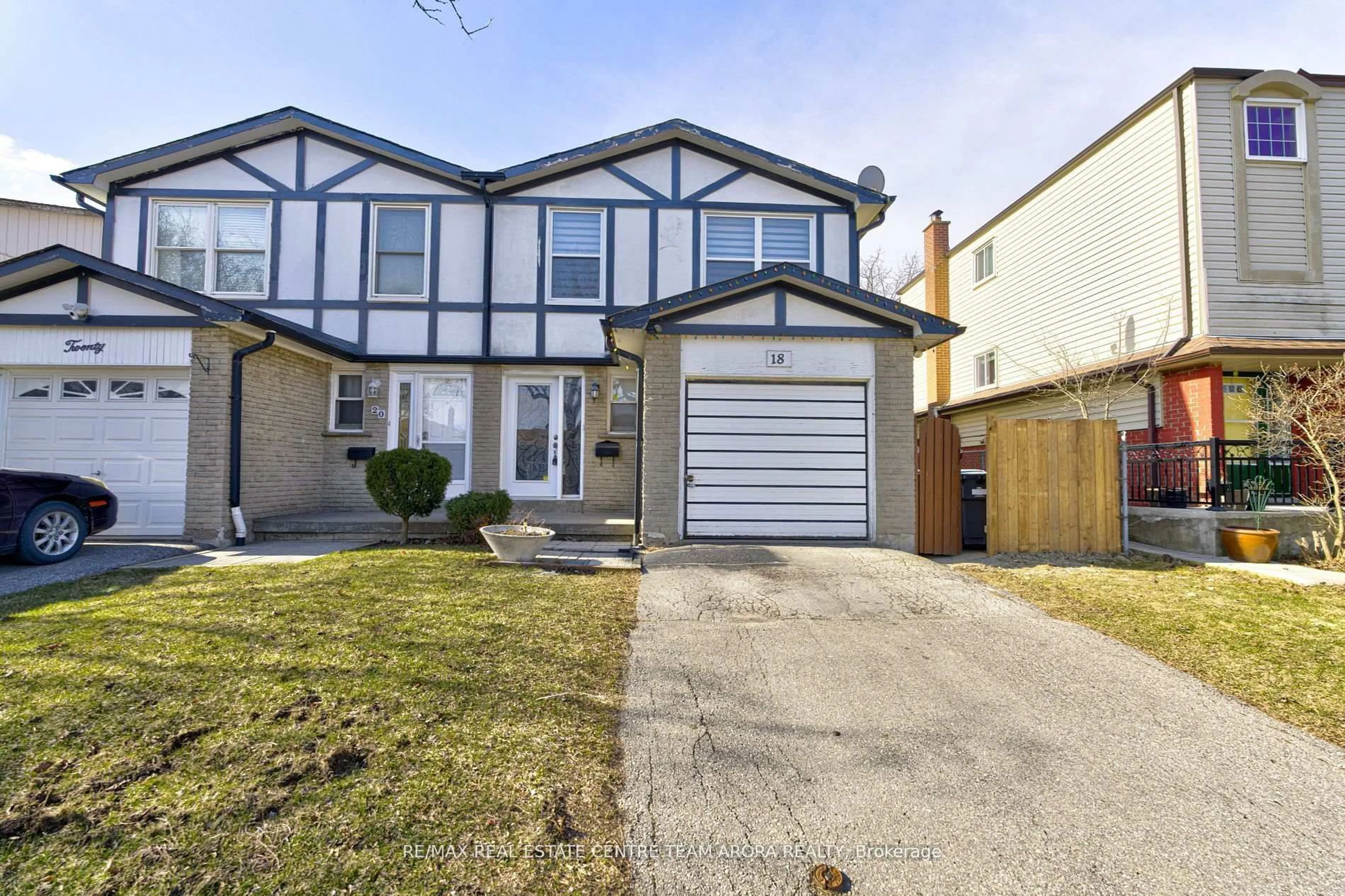 Home with vinyl exterior material, street for 18 Abell Dr, Brampton Ontario L6V 2V8