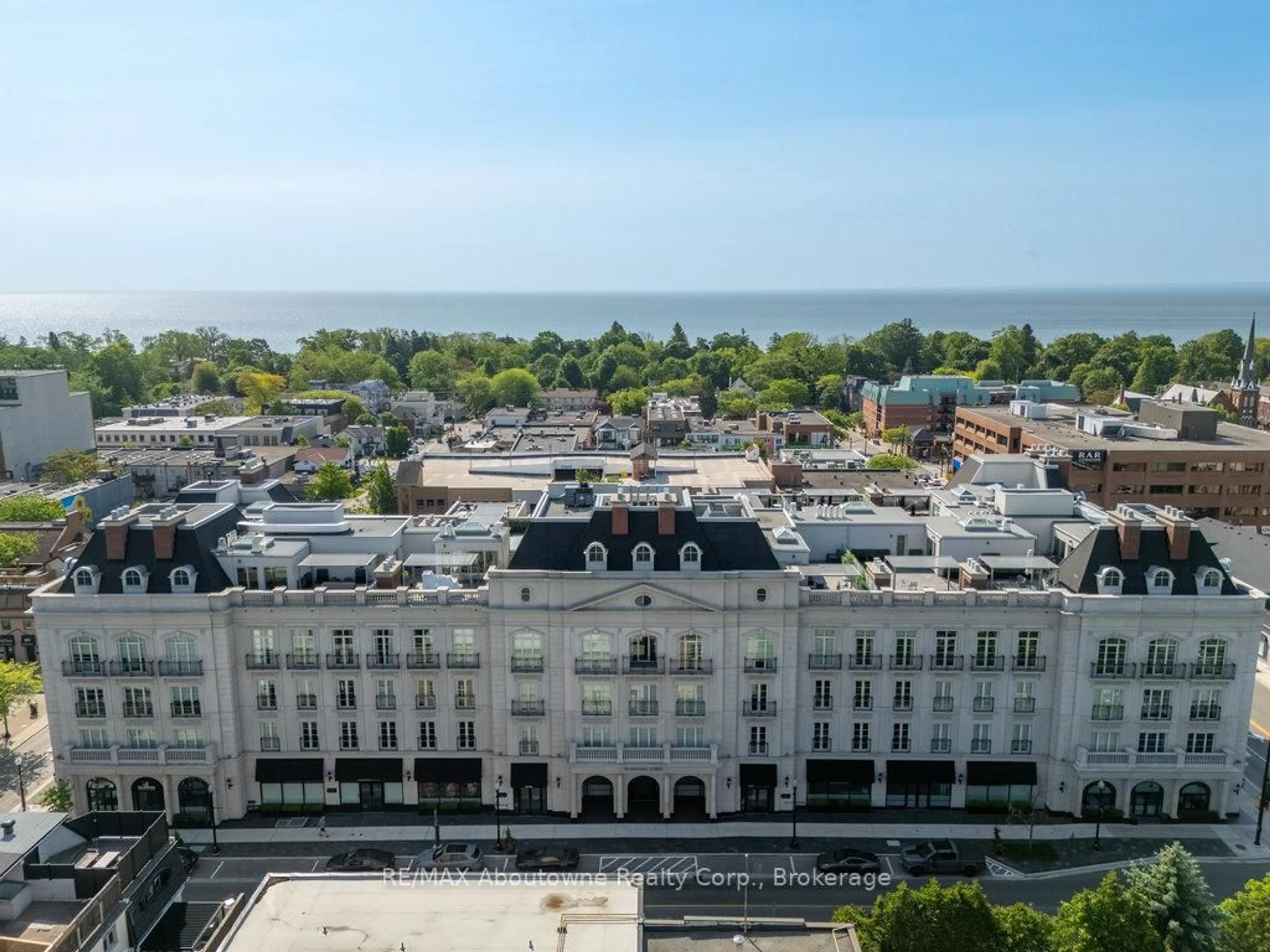 A pic from outside/outdoor area/front of a property/back of a property/a pic from drone, city buildings view from balcony for 300 Randall St #307, Oakville Ontario L6J 0G2
