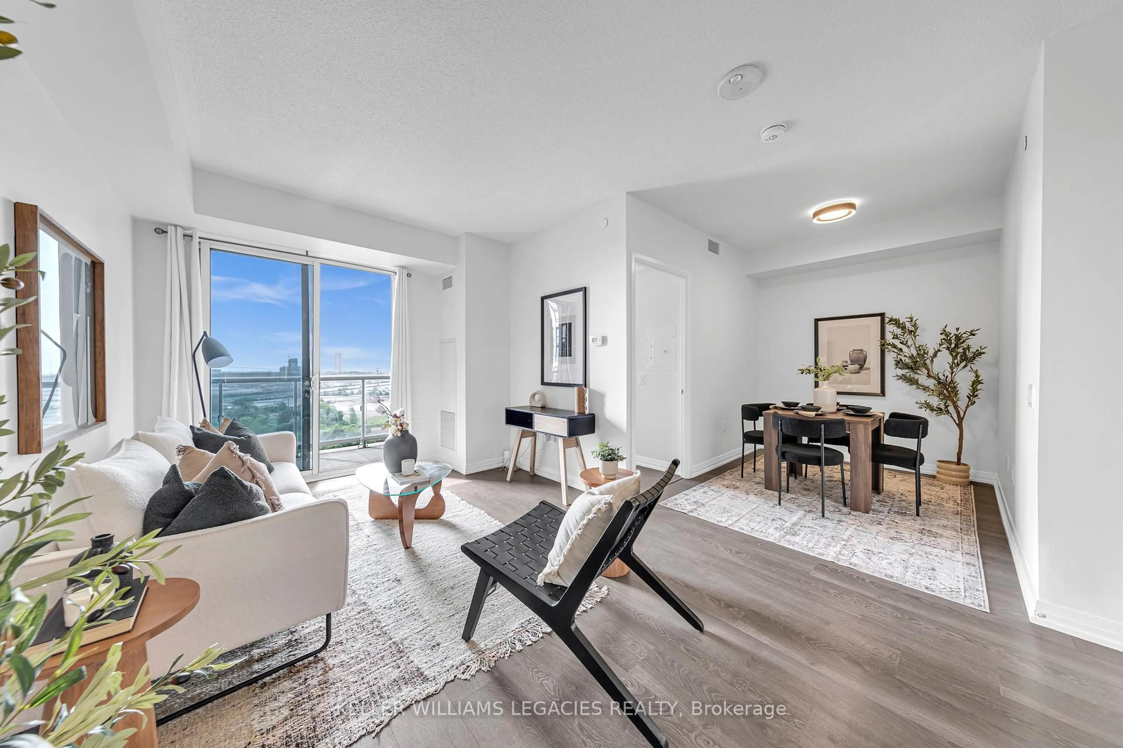 Living room with furniture, unknown for 50 Thomas Riley Rd #720, Toronto Ontario M9B 0C5
