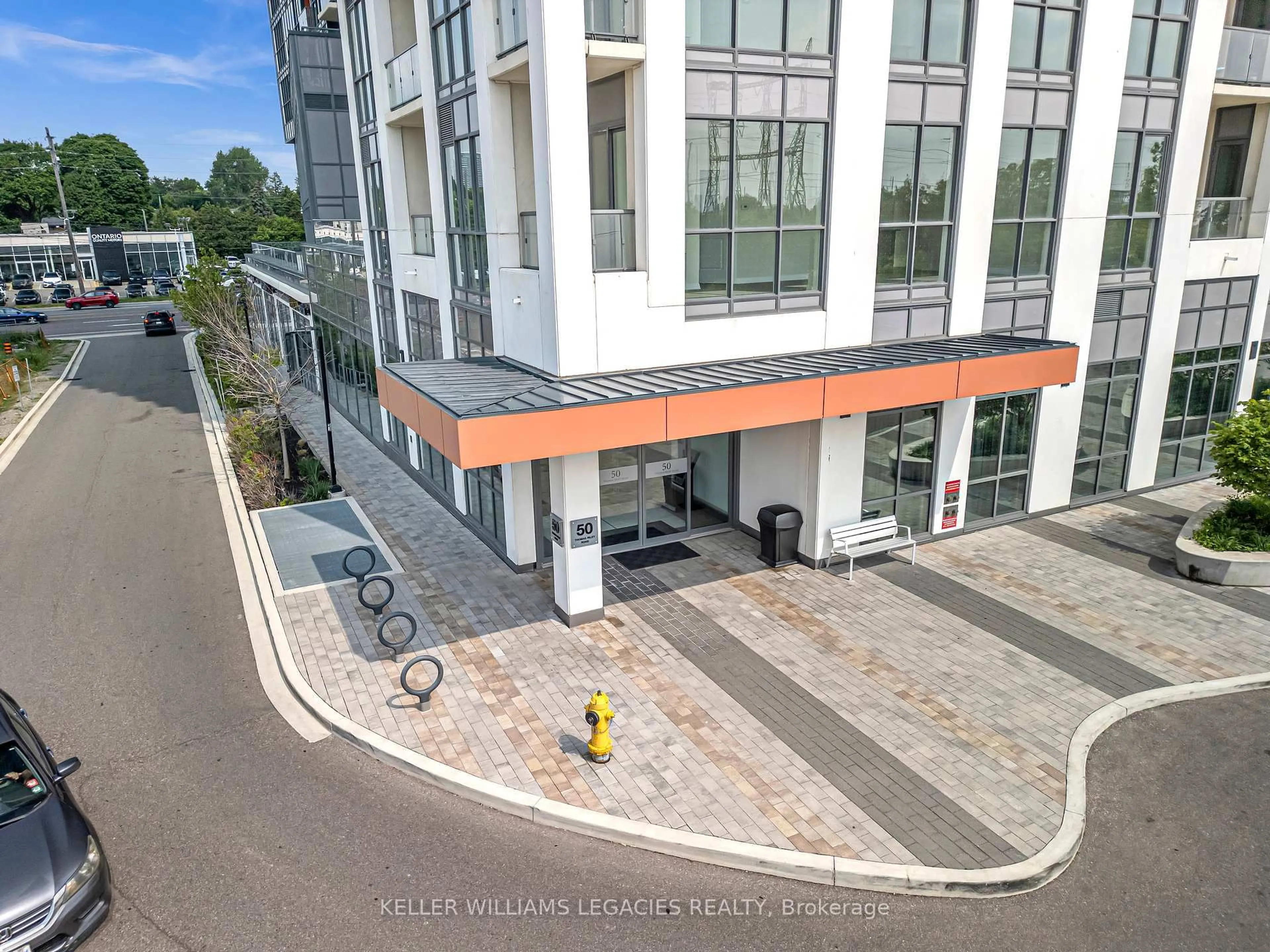 A pic from outside/outdoor area/front of a property/back of a property/a pic from drone, building for 50 Thomas Riley Rd #720, Toronto Ontario M9B 0C5