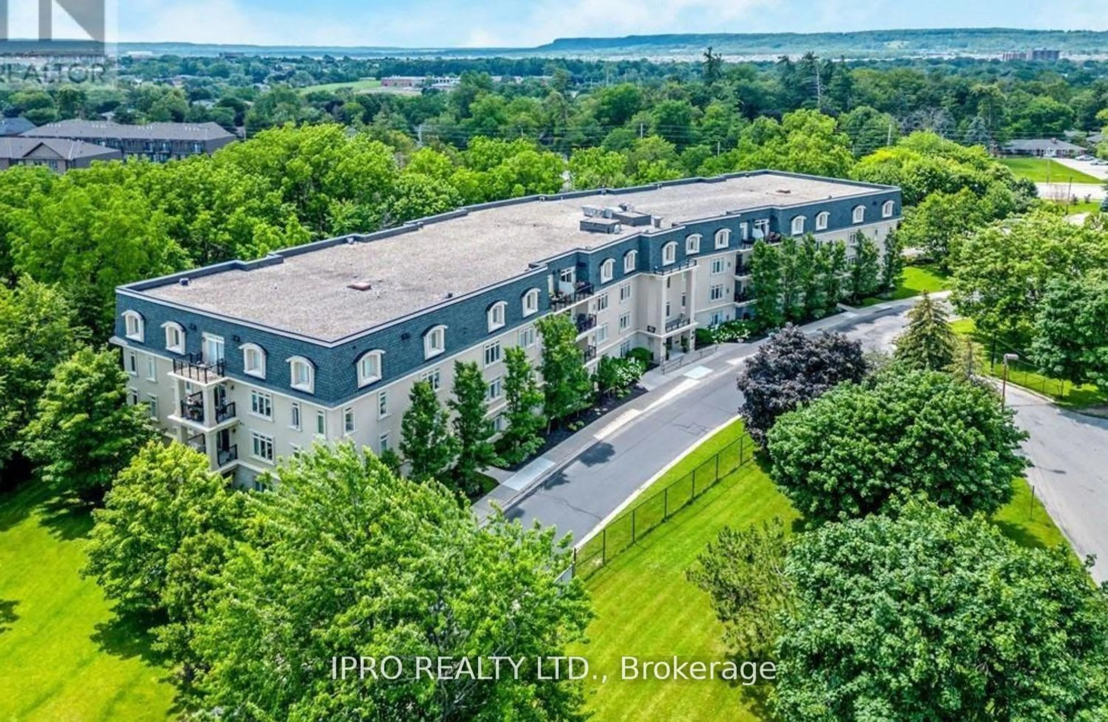 A pic from outside/outdoor area/front of a property/back of a property/a pic from drone, building for 443 Centennial Forest Dr #PH 408, Milton Ontario L9T 6A1