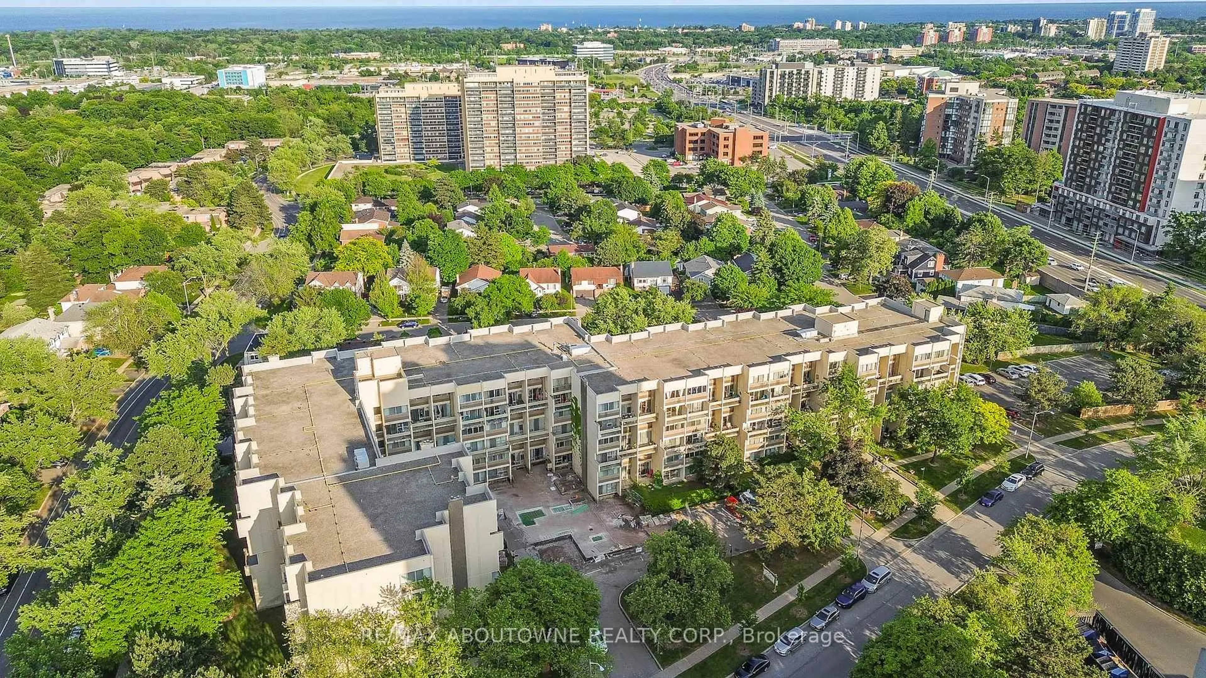 A pic from outside/outdoor area/front of a property/back of a property/a pic from drone, city buildings view from balcony for 1300 Marlborough Crt #523, Oakville Ontario L6H 2S2