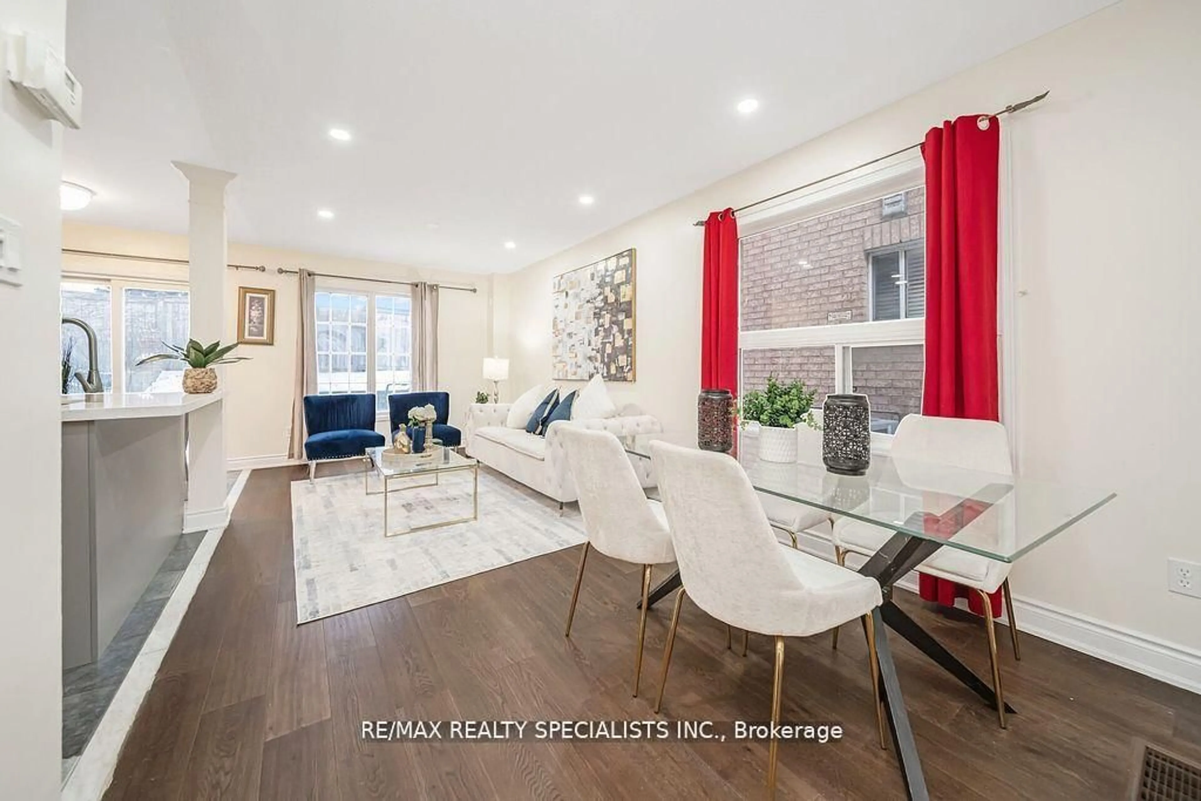 Living room with furniture, wood/laminate floor for 72 Ridgefield Crt, Brampton Ontario L6P 1B3