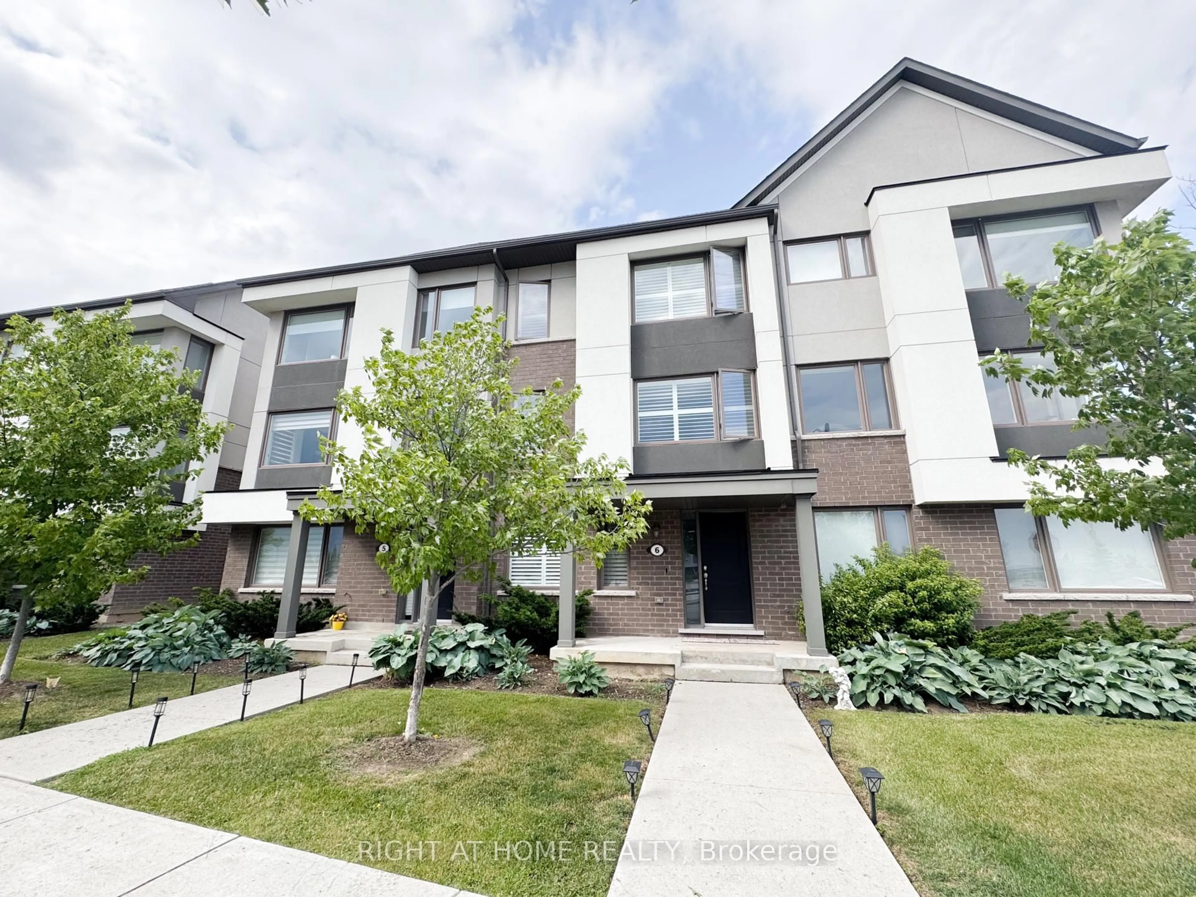 A pic from outside/outdoor area/front of a property/back of a property/a pic from drone, street for 1125 Leger Way #6, Milton Ontario L9E 1N7