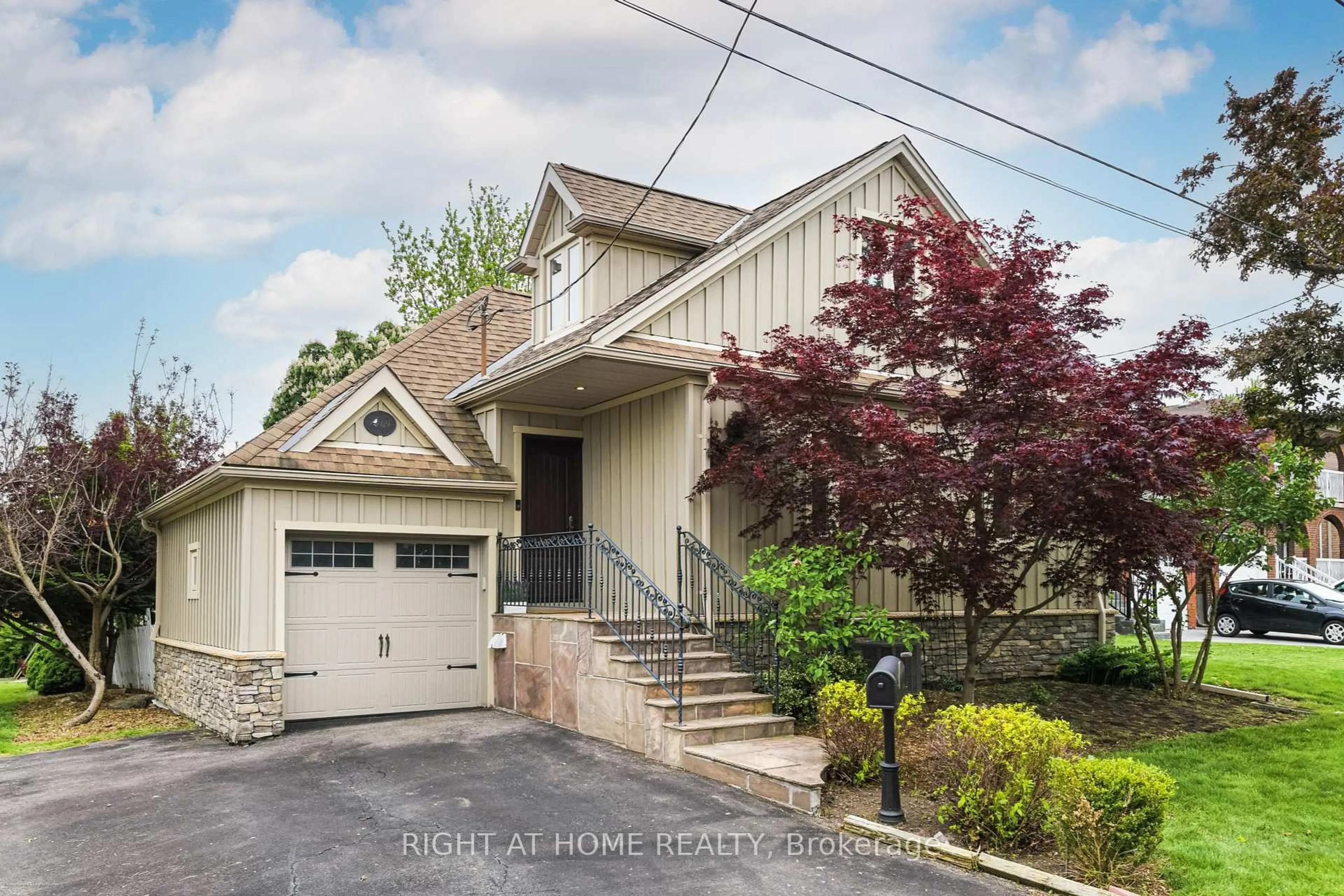 Home with vinyl exterior material, street for 69 Lilac Ave, Toronto Ontario M9M 1G4