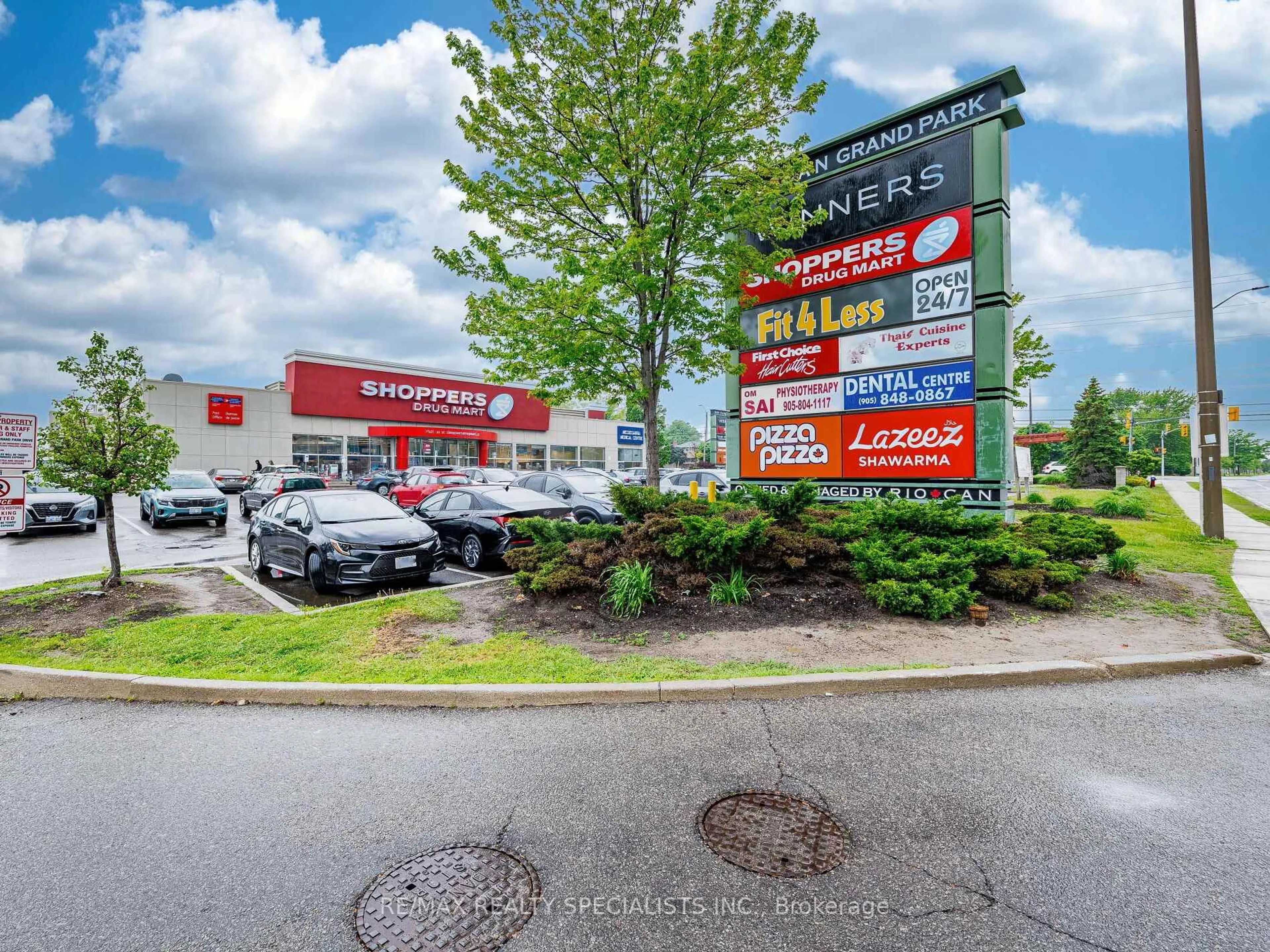 A pic from outside/outdoor area/front of a property/back of a property/a pic from drone, street for 3975 Grand Park Dr #403, Mississauga Ontario L5B 0K4