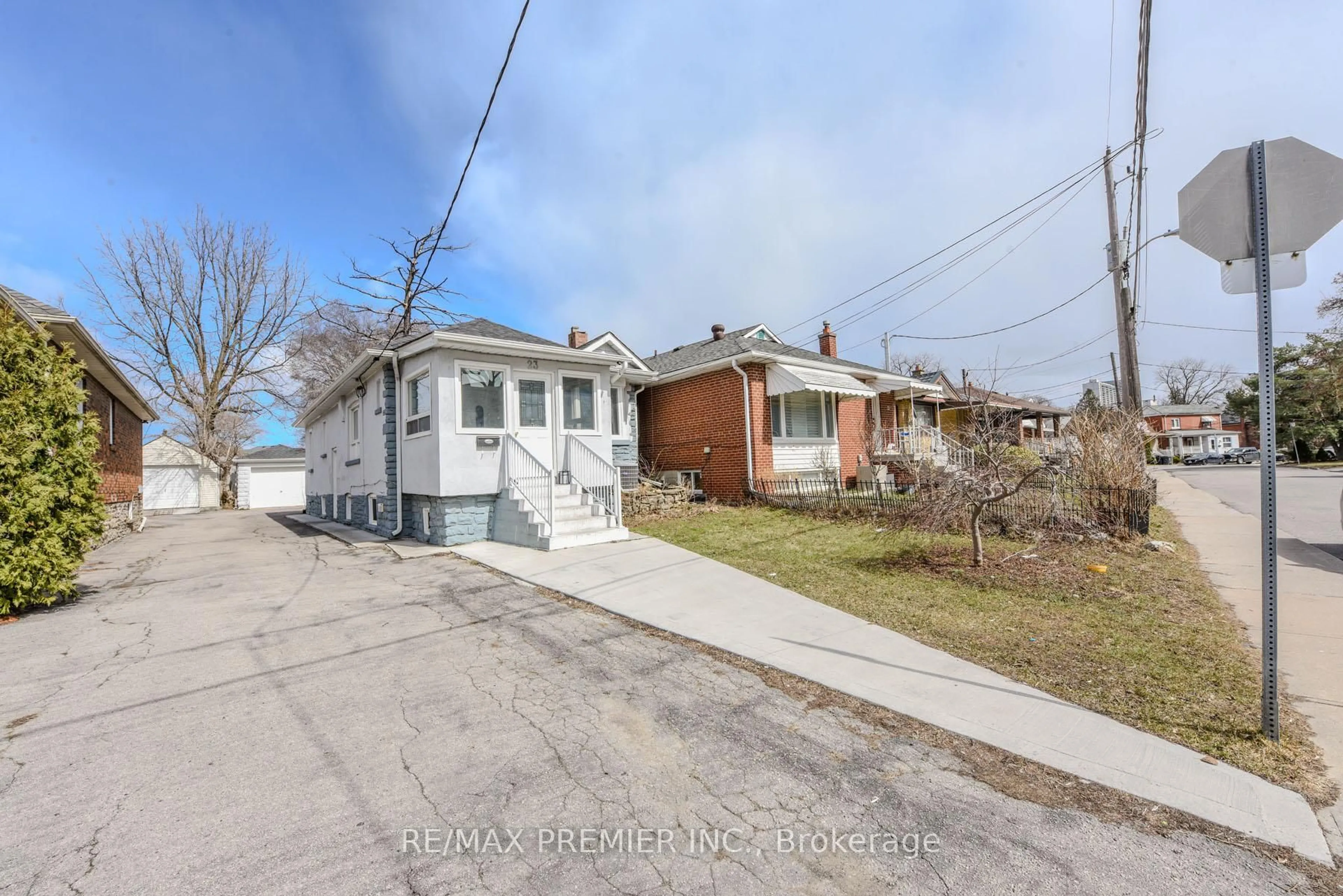 A pic from outside/outdoor area/front of a property/back of a property/a pic from drone, street for 23 Rectory Rd, Toronto Ontario M9N 1R1