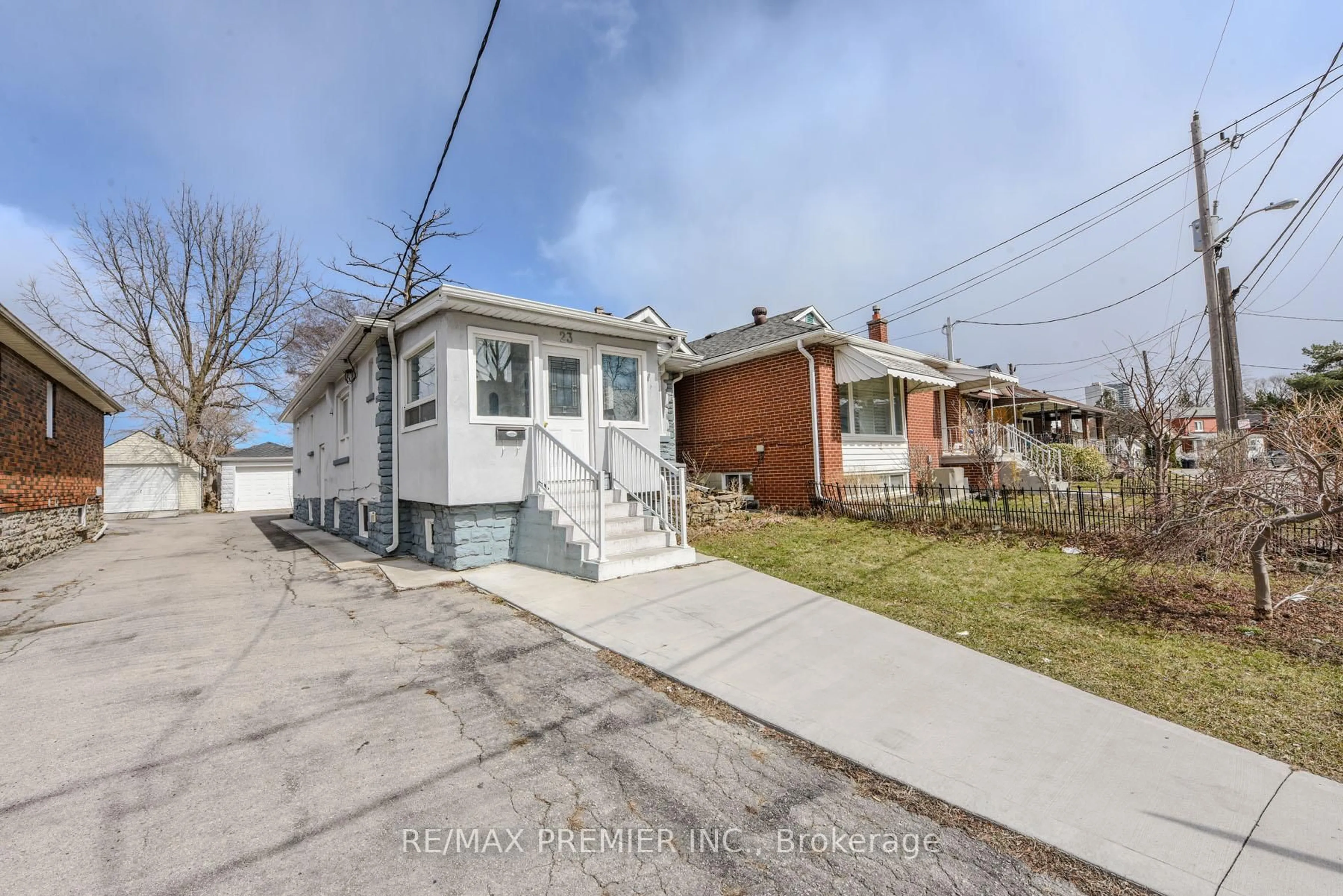 A pic from outside/outdoor area/front of a property/back of a property/a pic from drone, street for 23 Rectory Rd, Toronto Ontario M9N 1R1