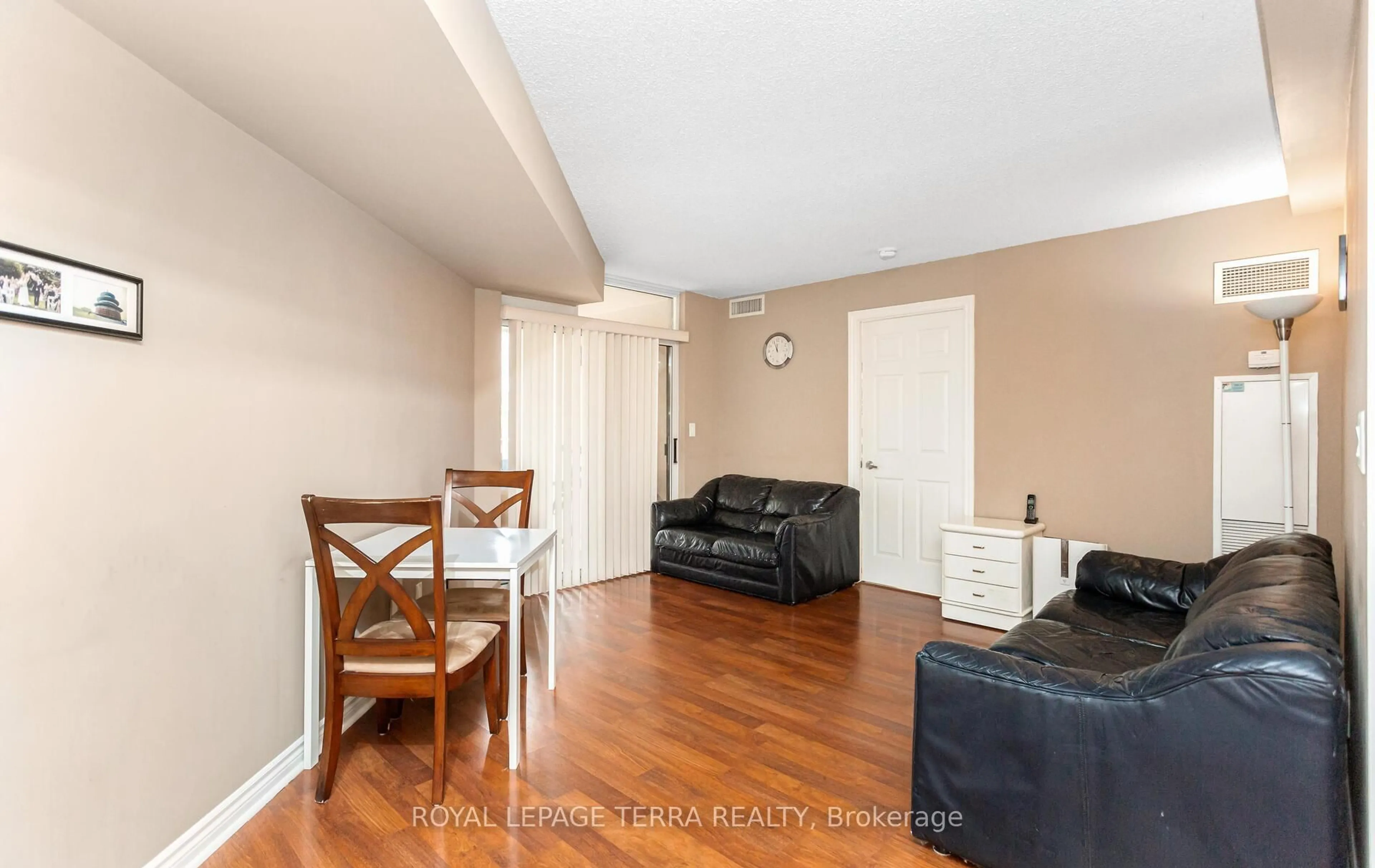 Living room with furniture, wood/laminate floor for 3888 Duke Of York Blvd #430, Mississauga Ontario L5B 4P5