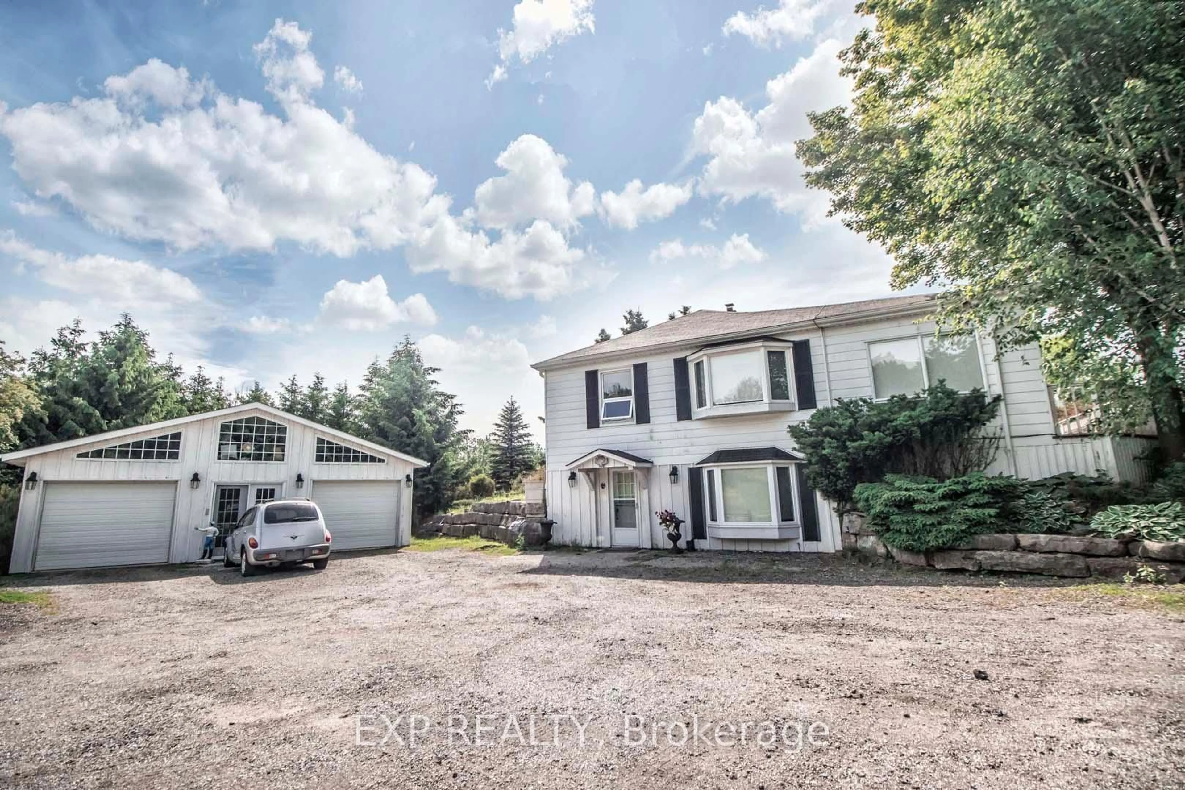 A pic from outside/outdoor area/front of a property/back of a property/a pic from drone, street for 18862 Centreville Creek Rd, Caledon Ontario L7K 2M9