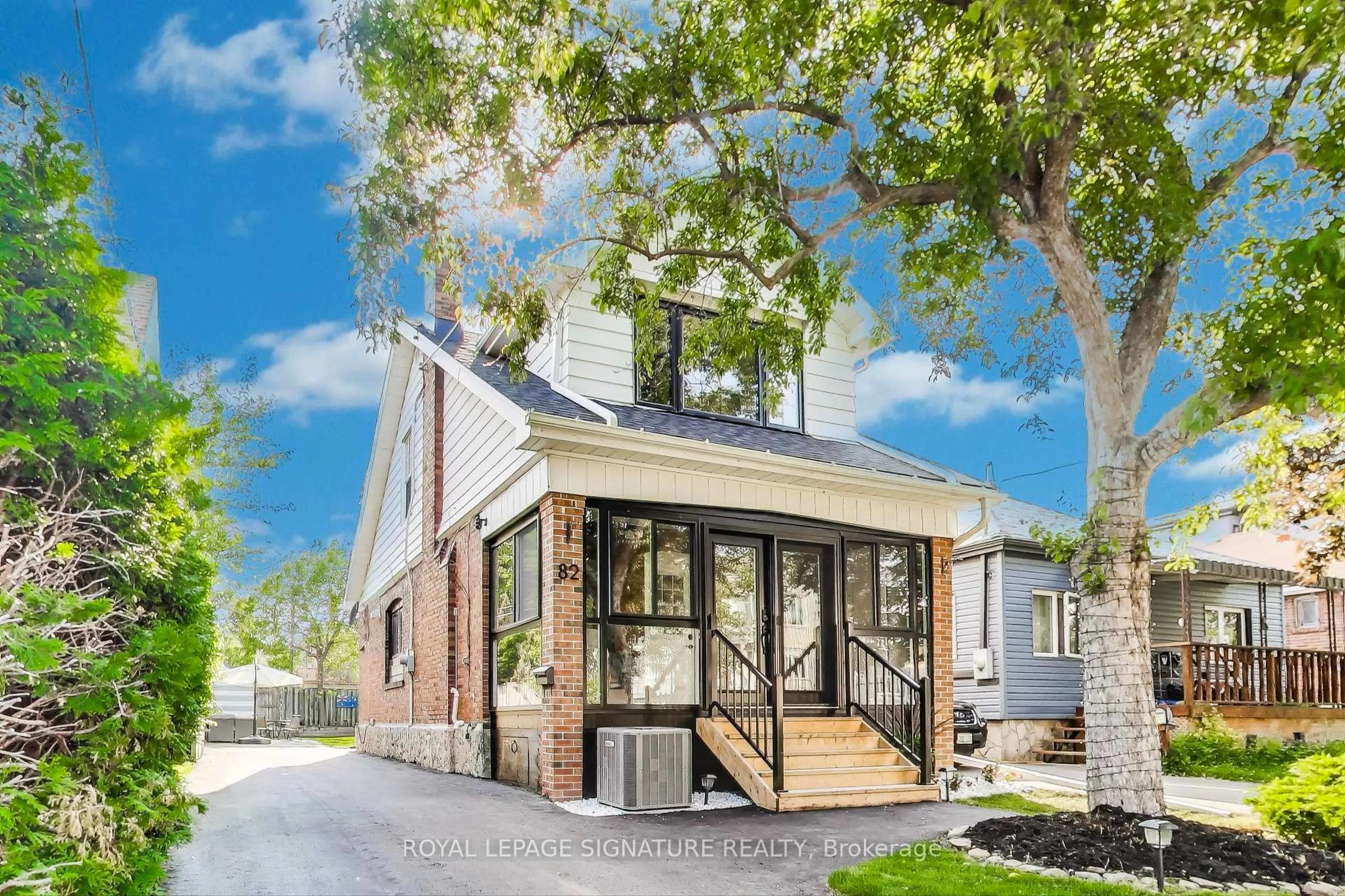 Home with brick exterior material, street for 82 Twenty Second St, Toronto Ontario M8V 3M4