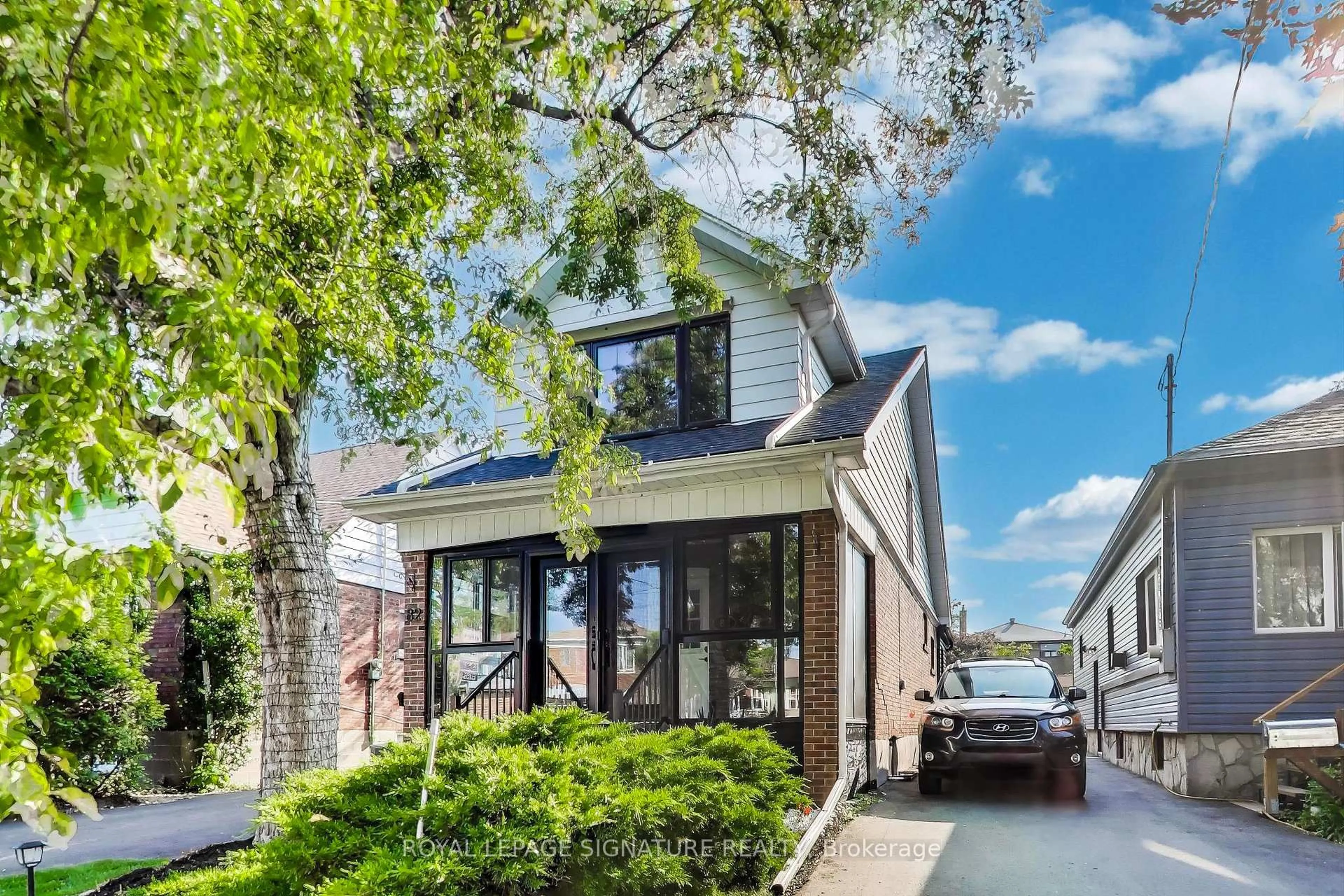 Home with brick exterior material, street for 82 Twenty Second St, Toronto Ontario M8V 3M4