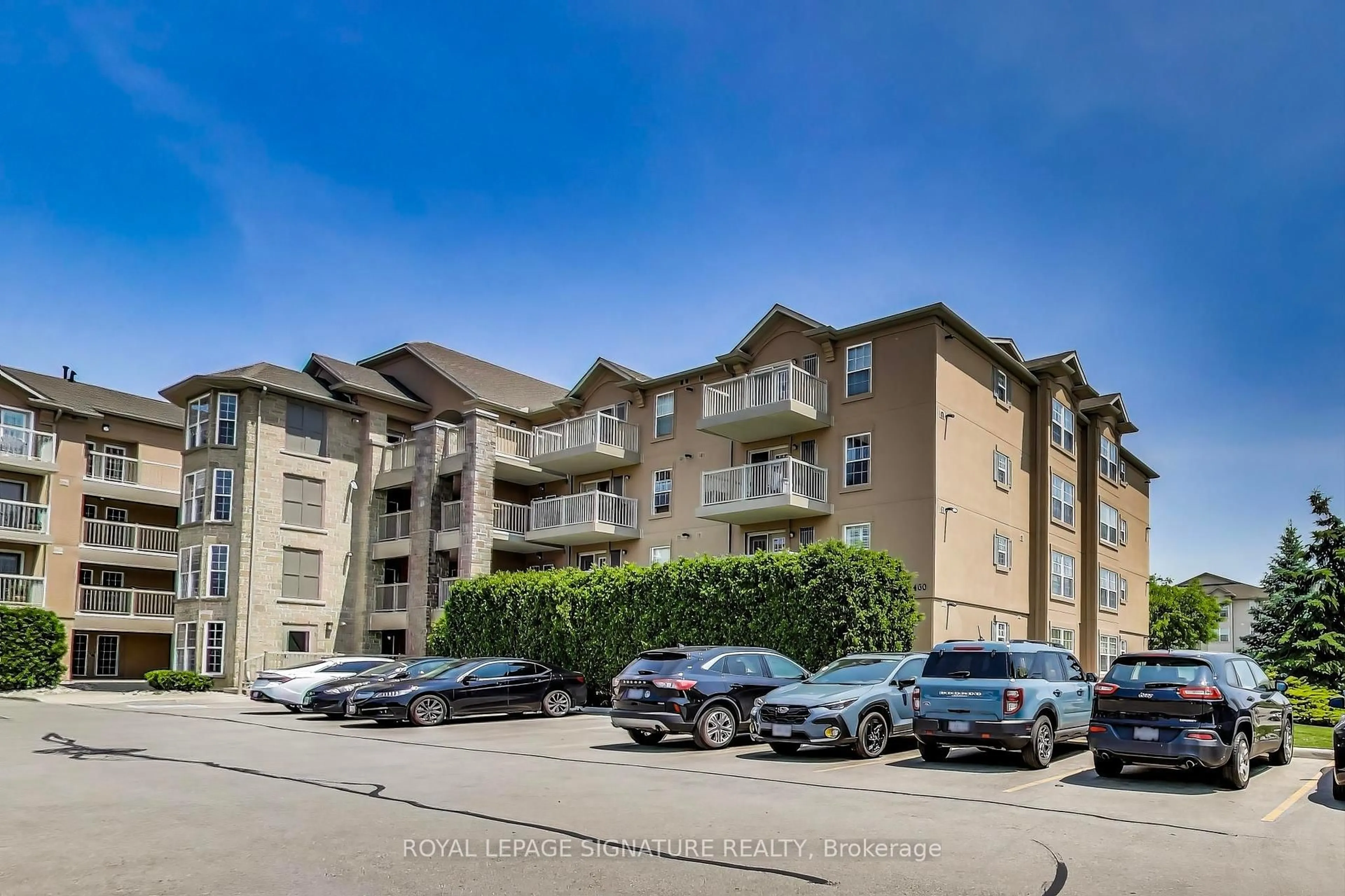 A pic from outside/outdoor area/front of a property/back of a property/a pic from drone, unknown for 1460 Bishops Gate #411, Oakville Ontario L6M 4N5