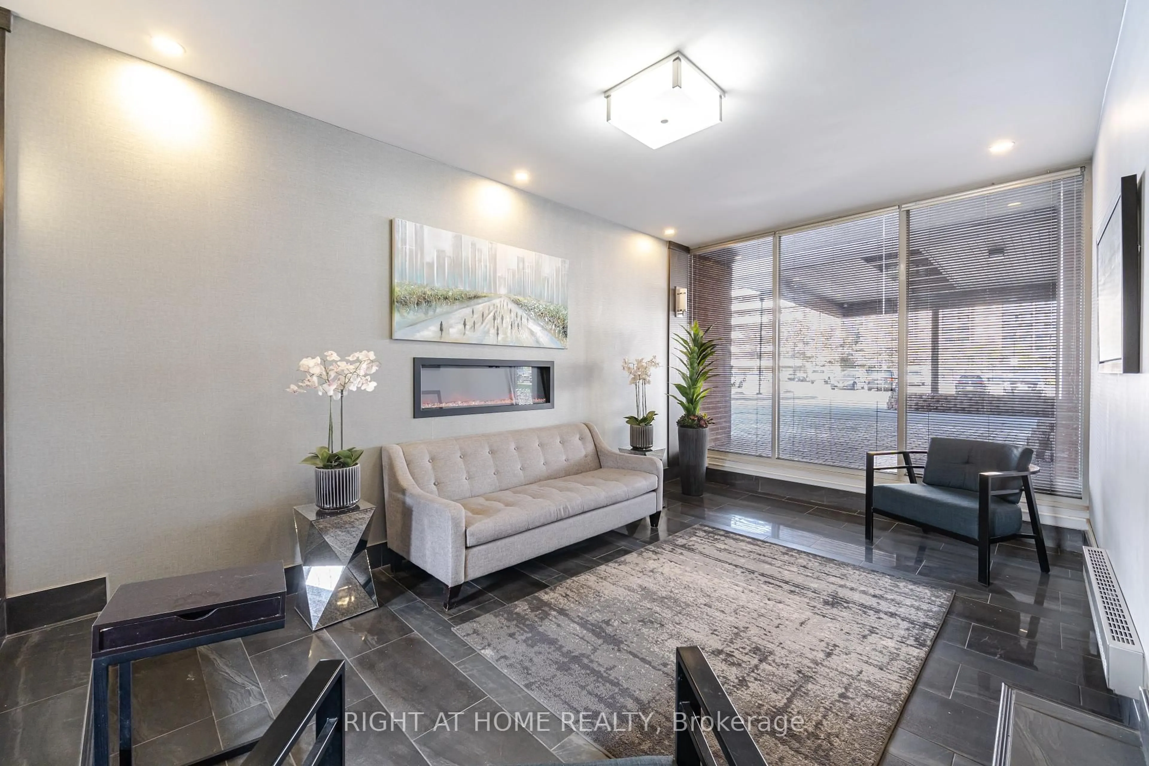 Living room with furniture, unknown for 1660 Bloor St #205, Mississauga Ontario L4X 1R9