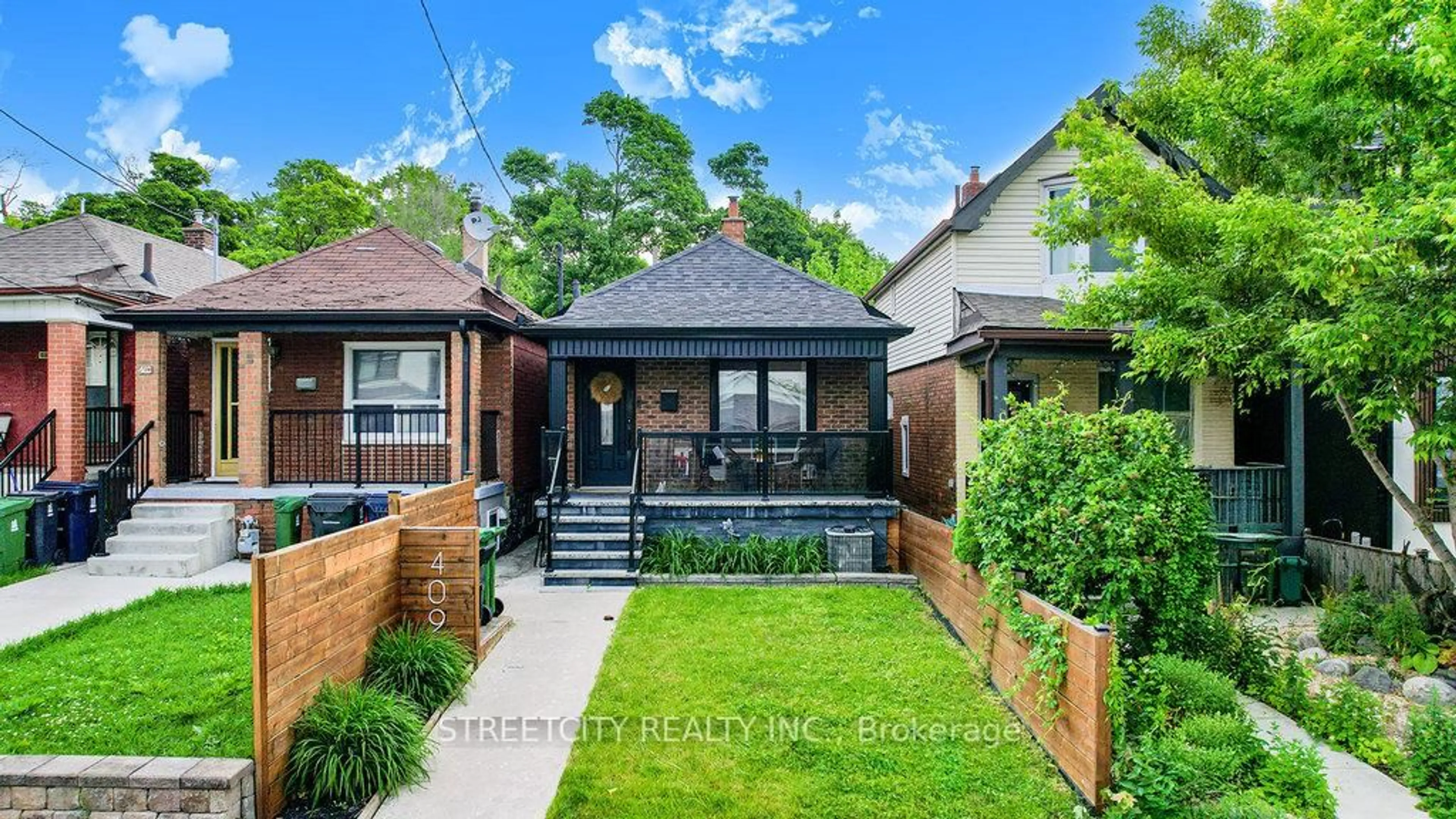 Home with brick exterior material, street for 409 Mcroberts Ave, Toronto Ontario M6E 4R1