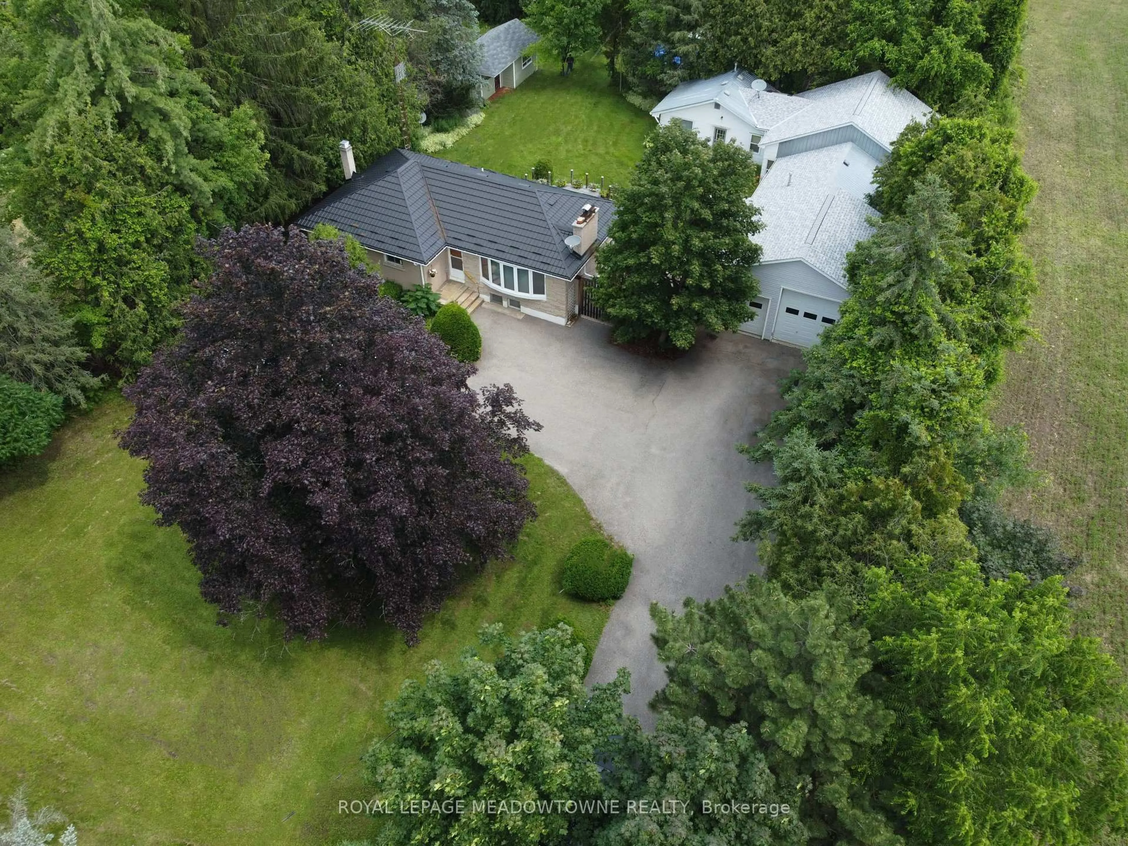 A pic from outside/outdoor area/front of a property/back of a property/a pic from drone, unknown for 13181 Hwy 7, Halton Hills Ontario L7G 4S4