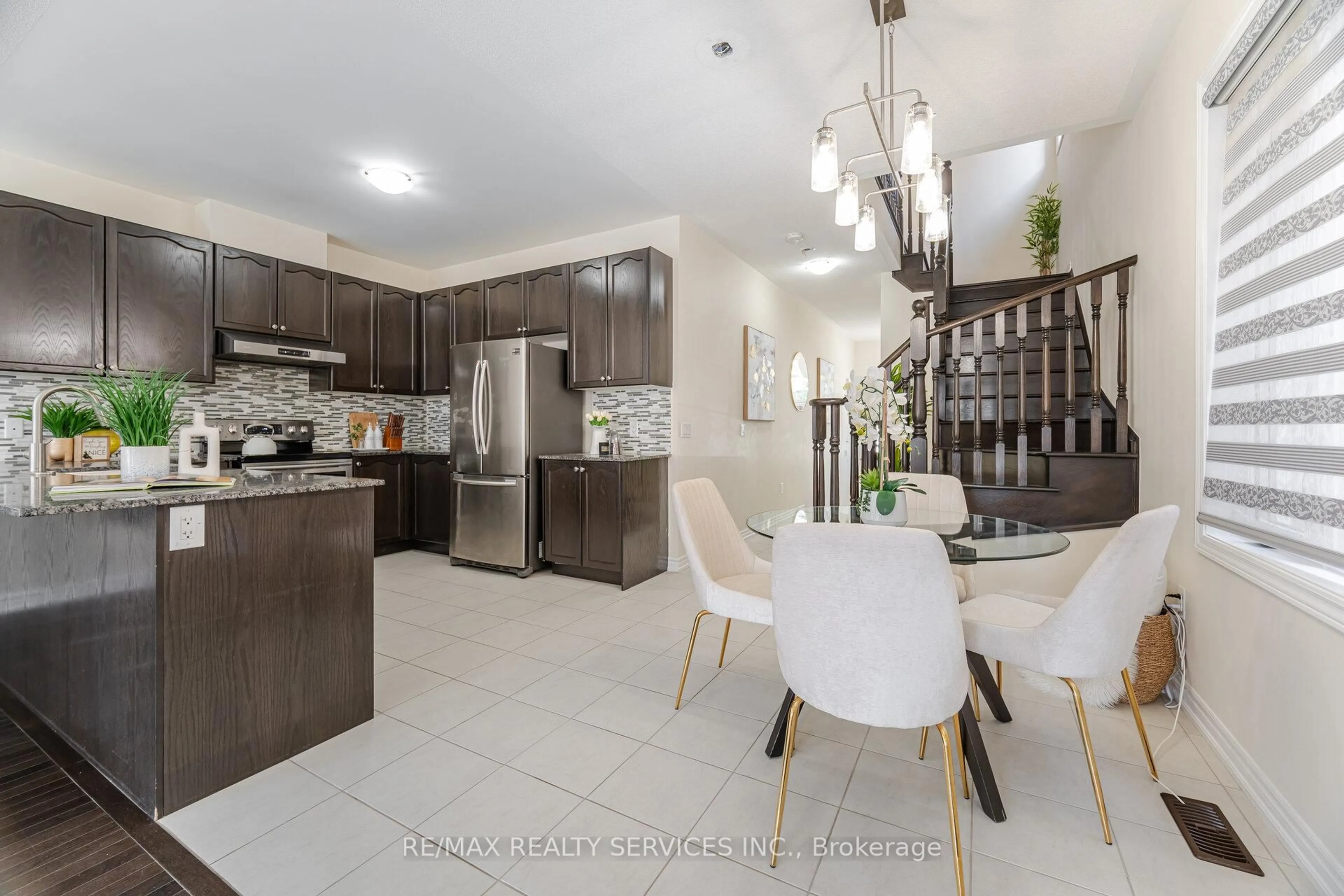 Open concept kitchen, ceramic/tile floor for 54 Maple Cider St, Caledon Ontario L7C 4B8