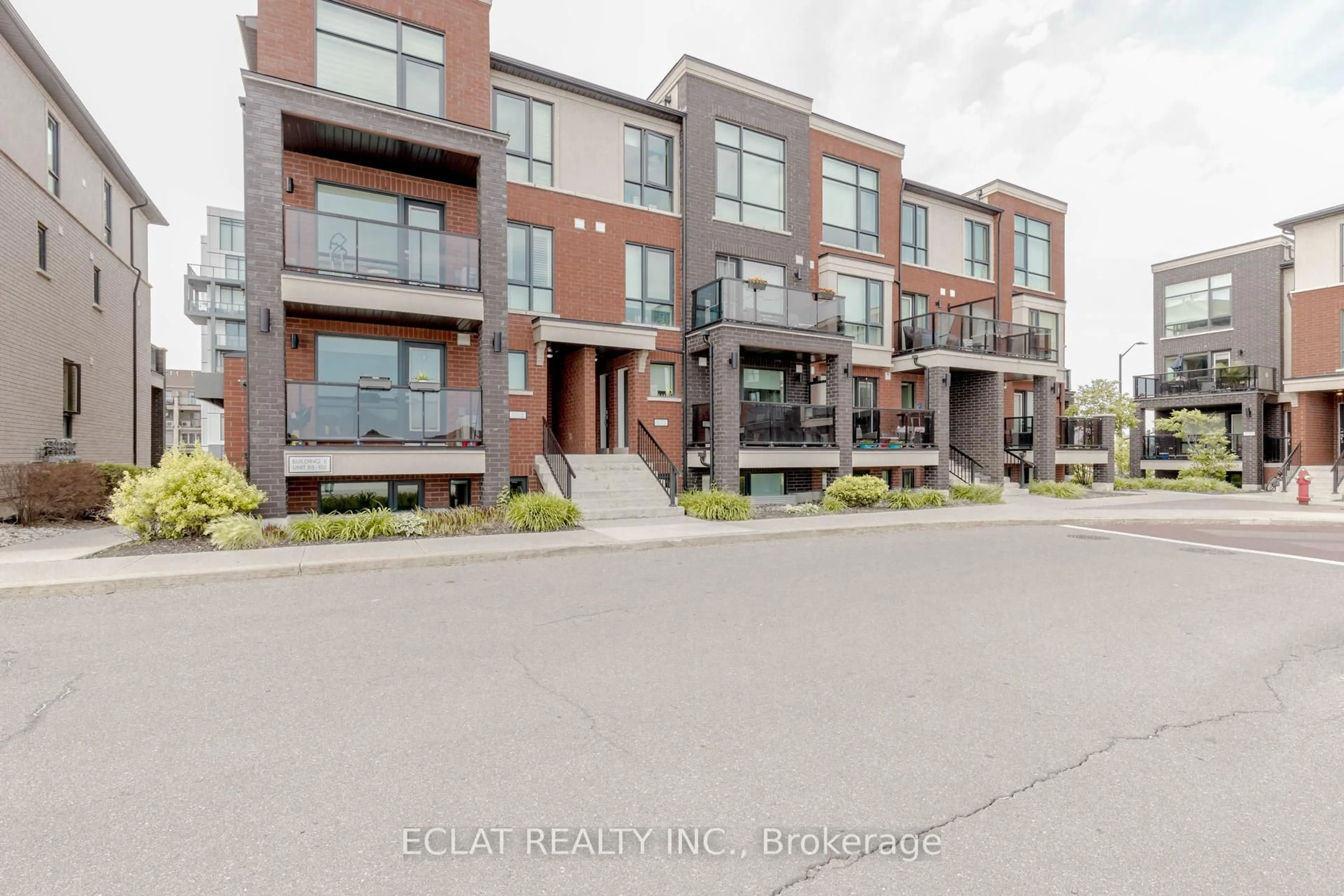 A pic from outside/outdoor area/front of a property/back of a property/a pic from drone, street for 100 Dufay Rd #100, Brampton Ontario L7A 4S3