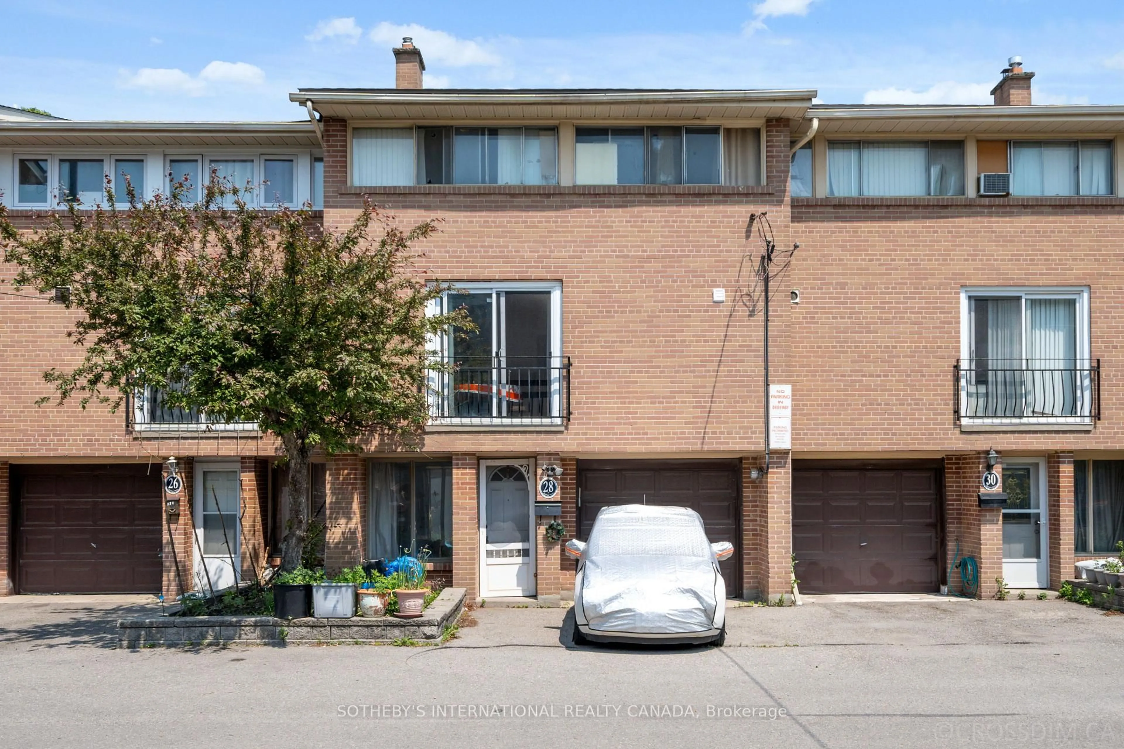 Home with brick exterior material, street for 28 Enclave Mews, Toronto Ontario M3M 3J6