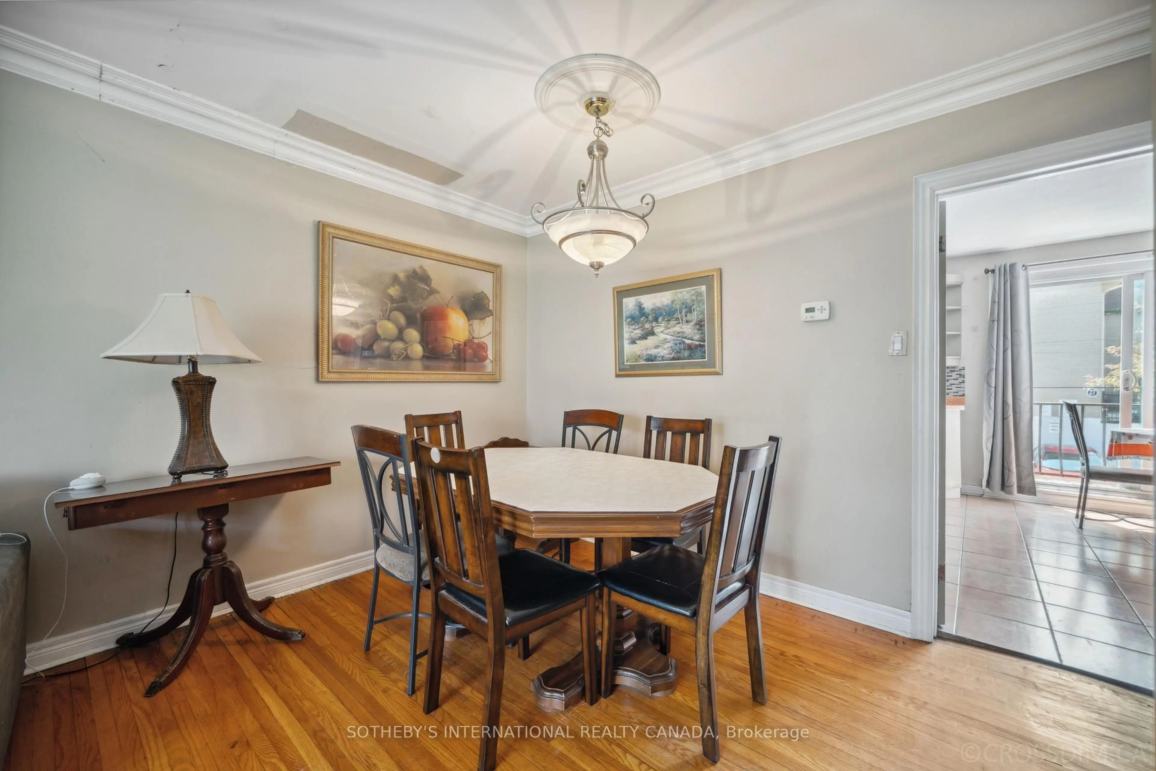 Dining room, wood/laminate floor for 28 Enclave Mews, Toronto Ontario M3M 3J6