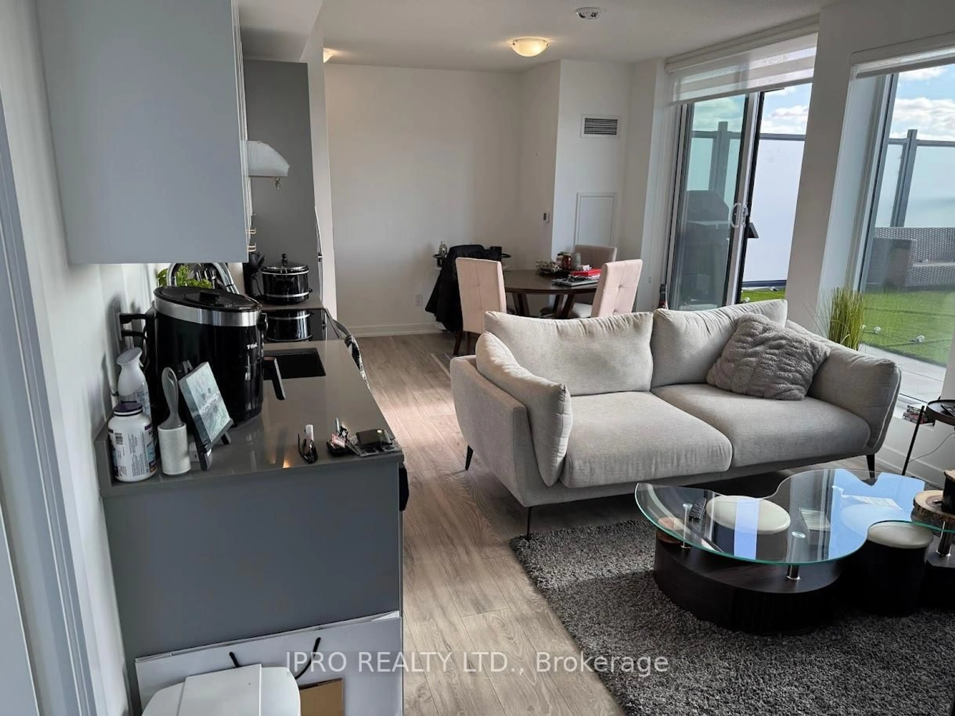 Living room with furniture, unknown for 3200 Dakota Common #A507, Burlington Ontario L7M 2A8
