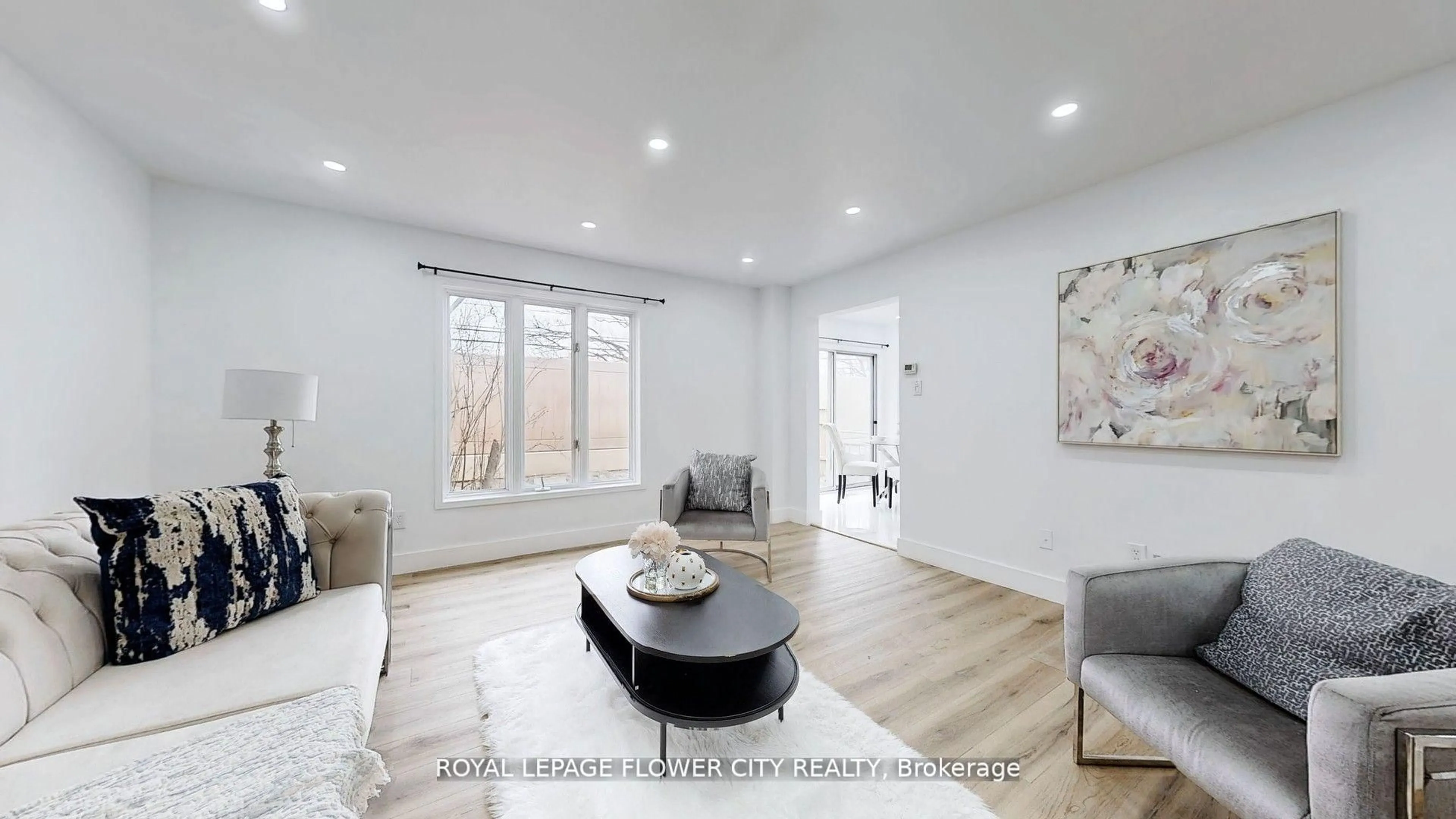 Living room with furniture, wood/laminate floor for 101 Chipmunk Cres, Brampton Ontario L6R 1B4