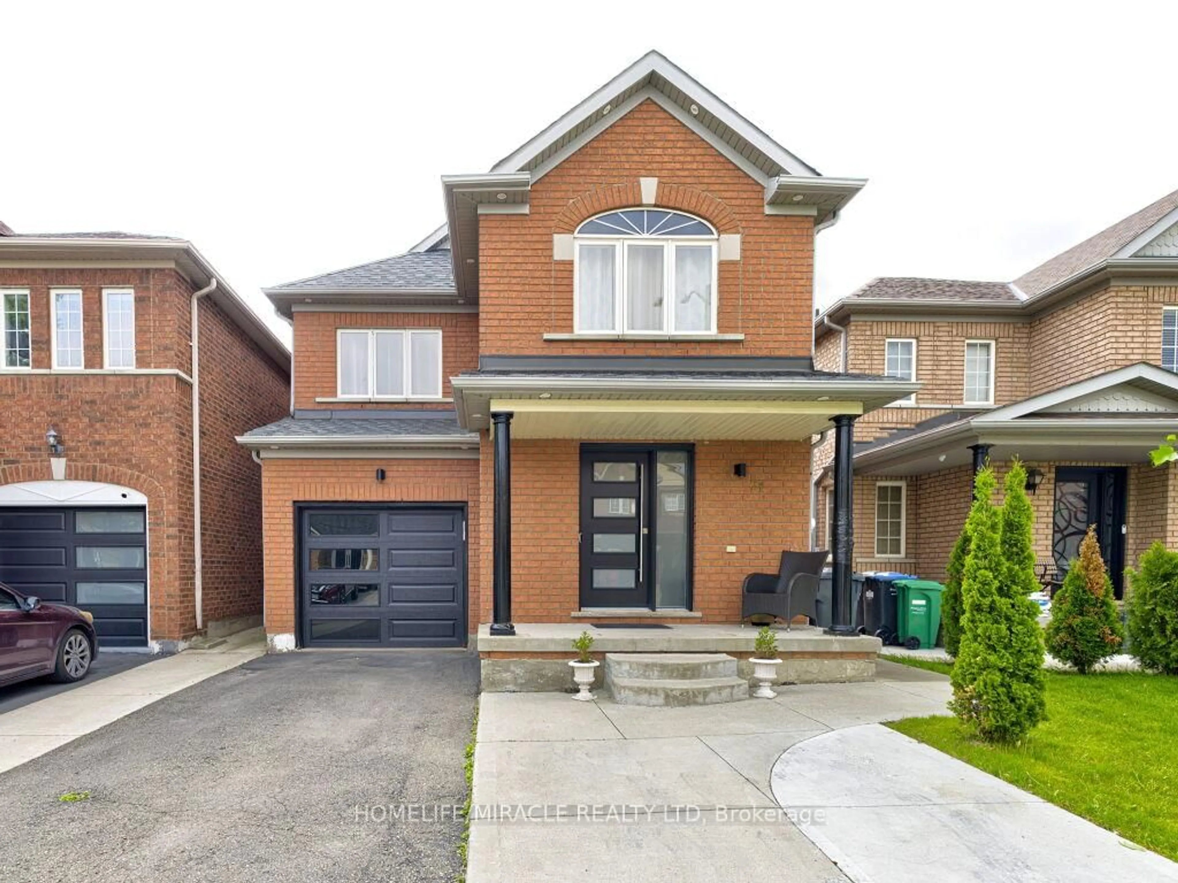 Home with brick exterior material, street for 21 Tideland Dr, Brampton Ontario L7A 2W3