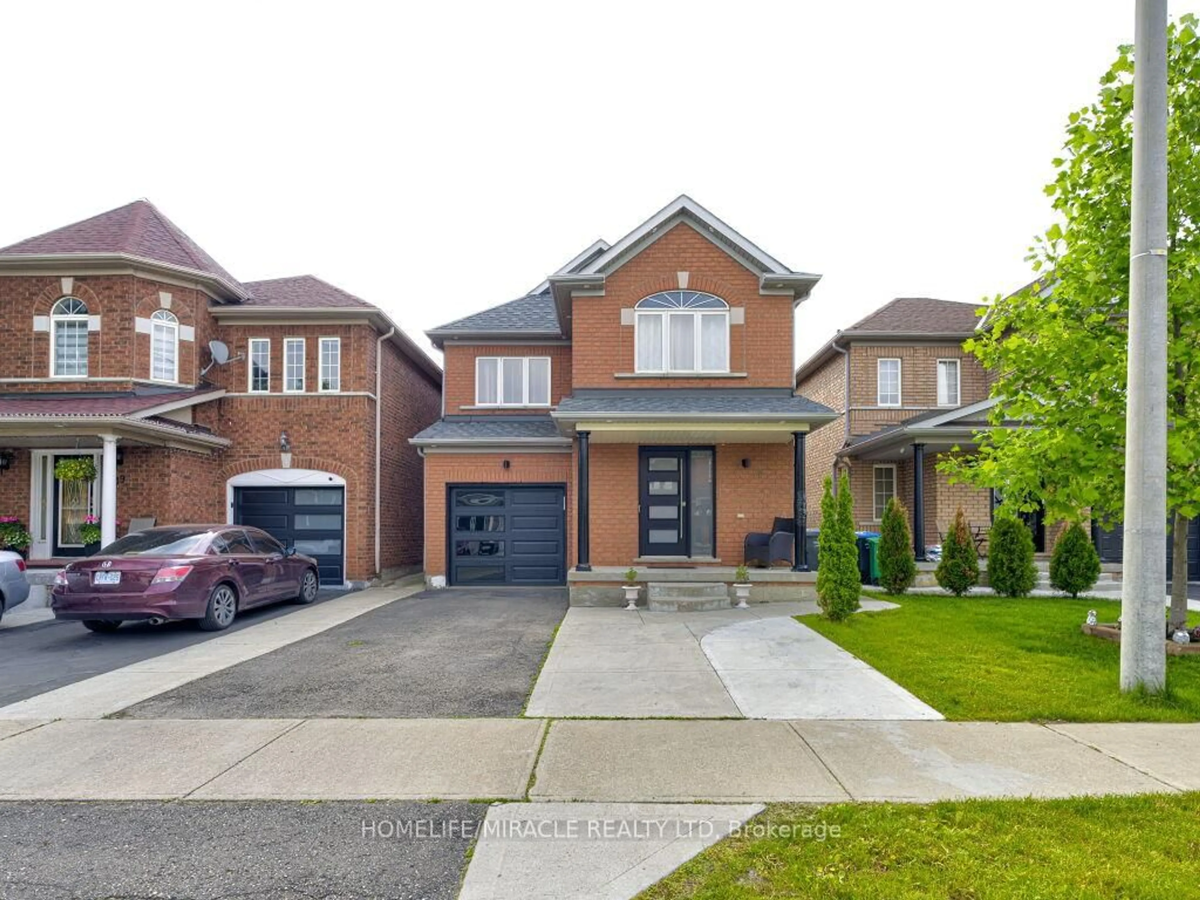 Home with brick exterior material, street for 21 Tideland Dr, Brampton Ontario L7A 2W3